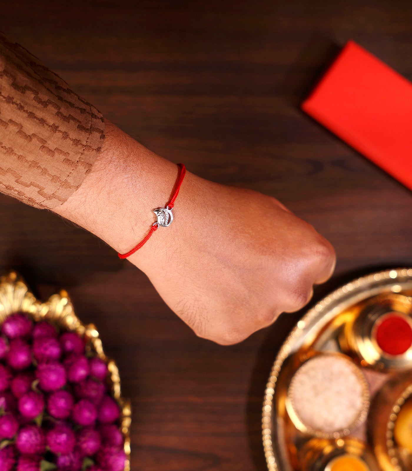 Shining Stone-studded Silver Rakhi