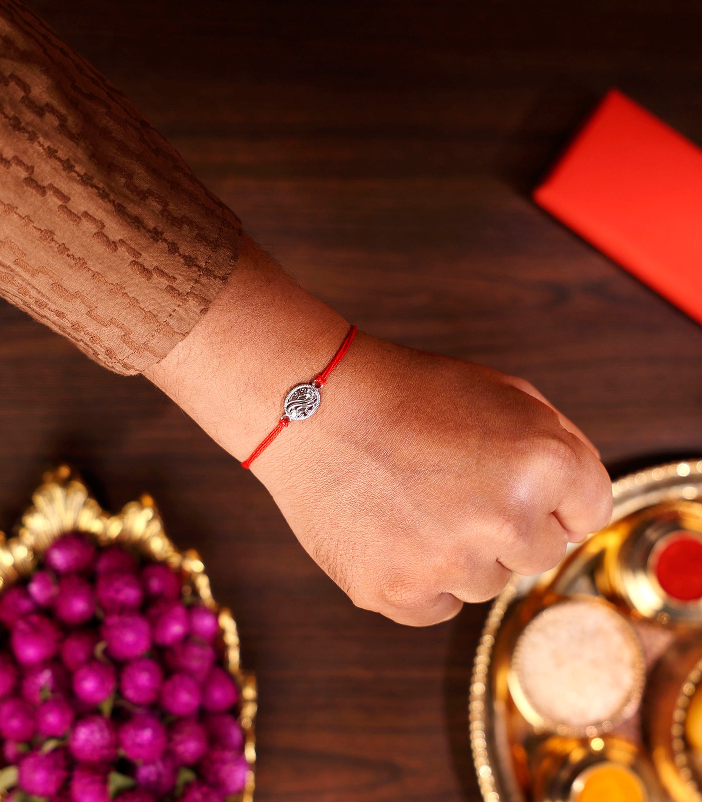 Designer Oval Silver Rakhi