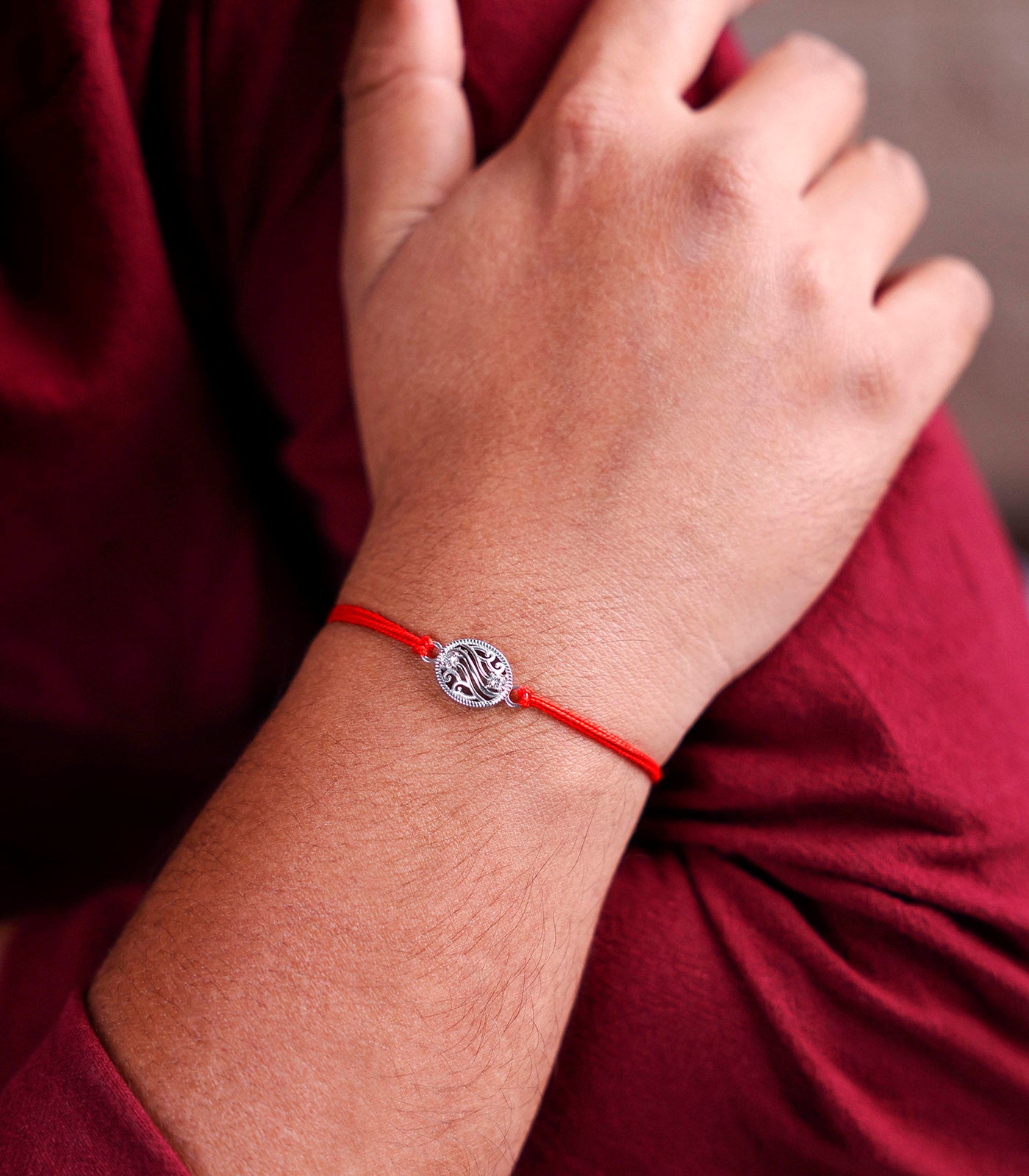 Designer Oval Silver Rakhi