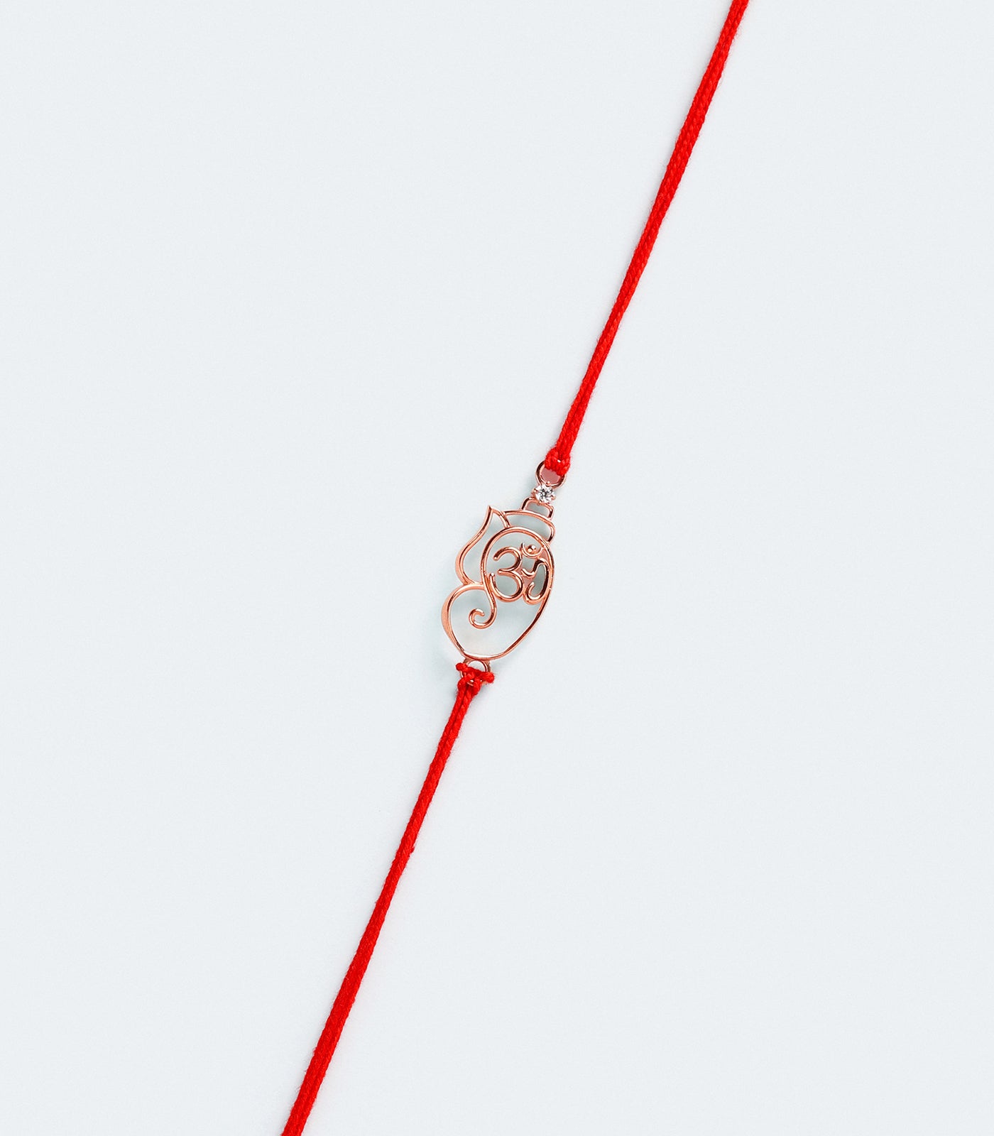 Divine Om and Ganesh Motif Silver Rakhi