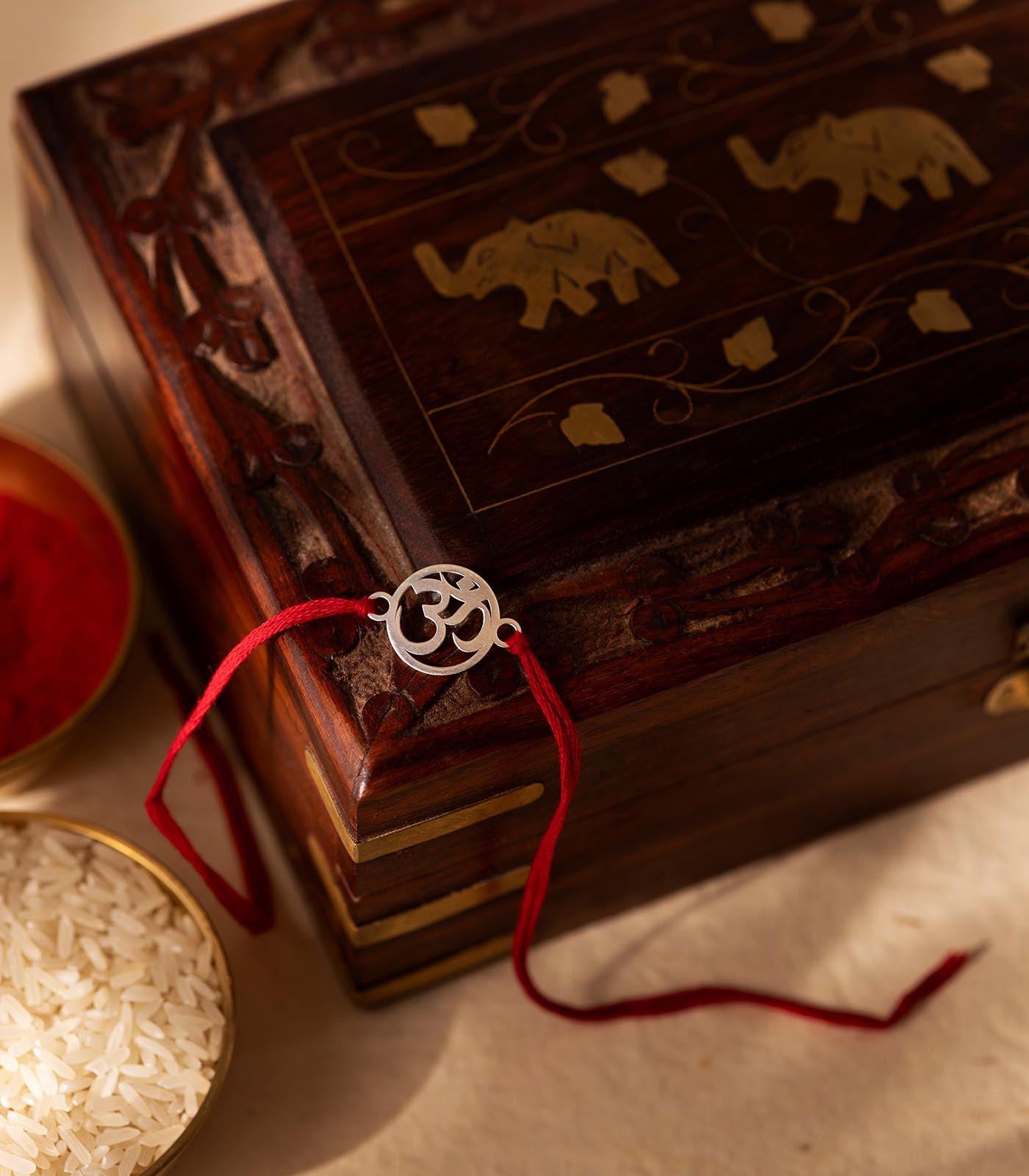 Ethereal Silver Rakhi - The Spiritual OM Cut Out Design