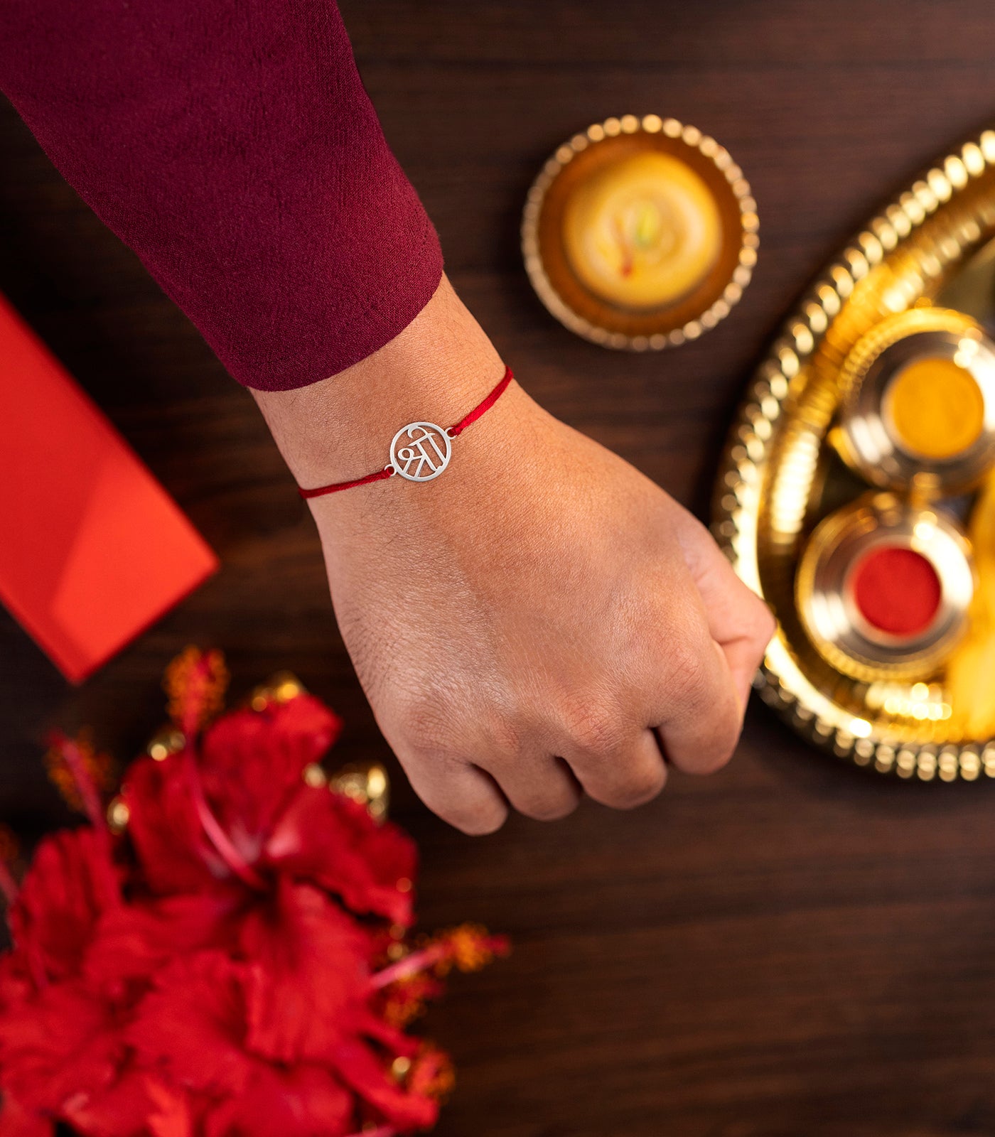 Lustrous Silver Rakhi - Divine Shree Design