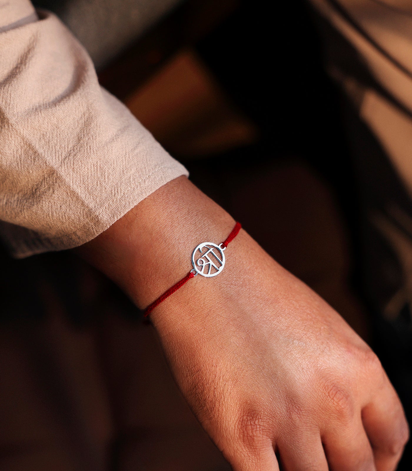 Lustrous Silver Rakhi - Divine Shree Design