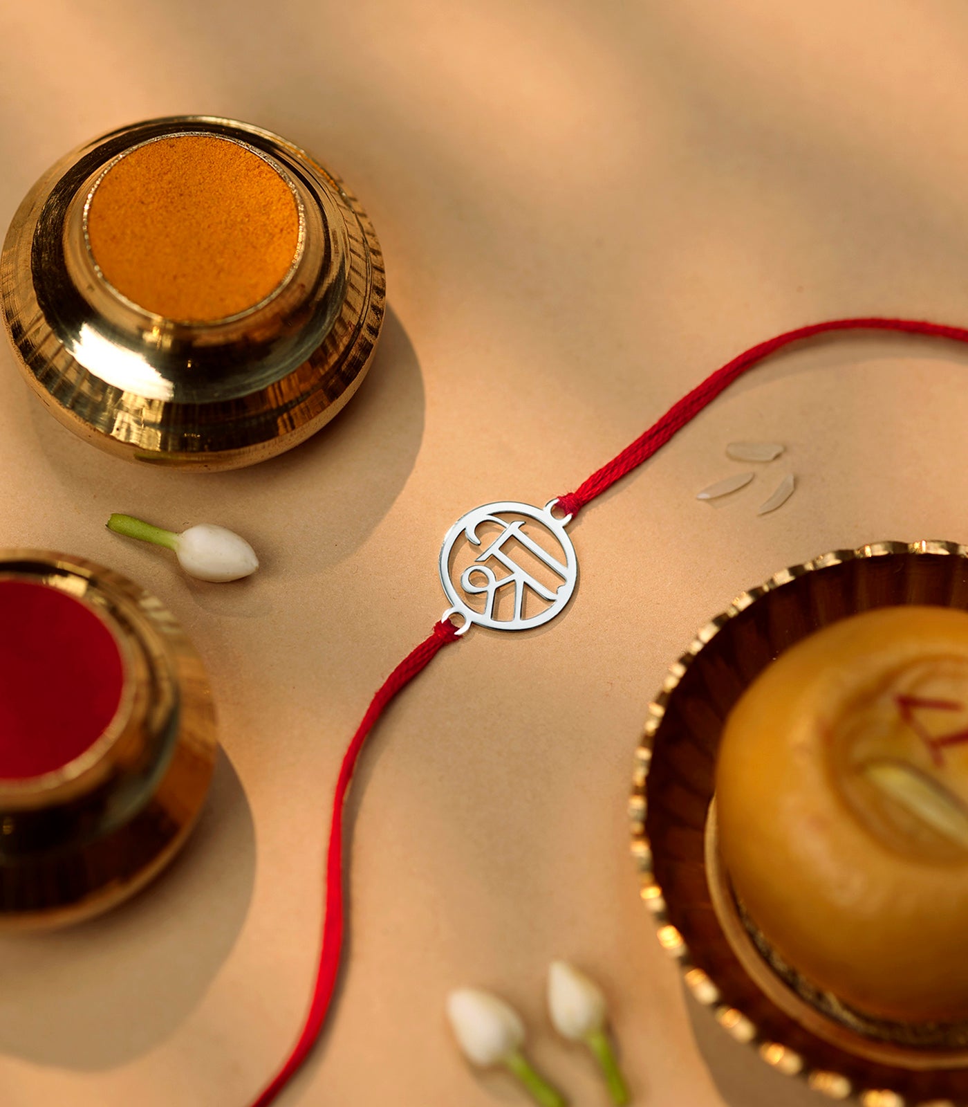 Lustrous Silver Rakhi - Divine Shree Design