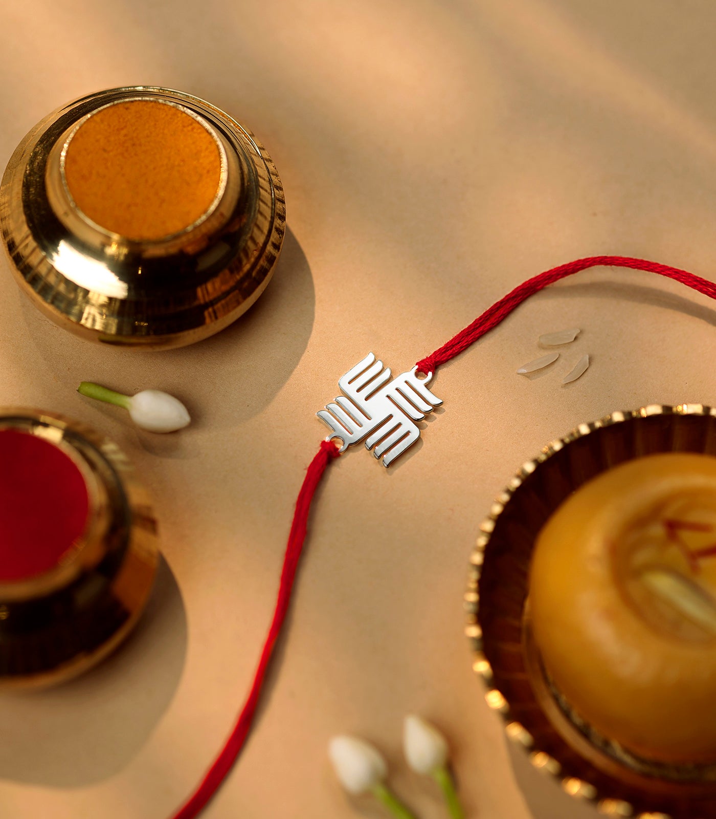 Radiant Silver Rakhi - Swastik Design