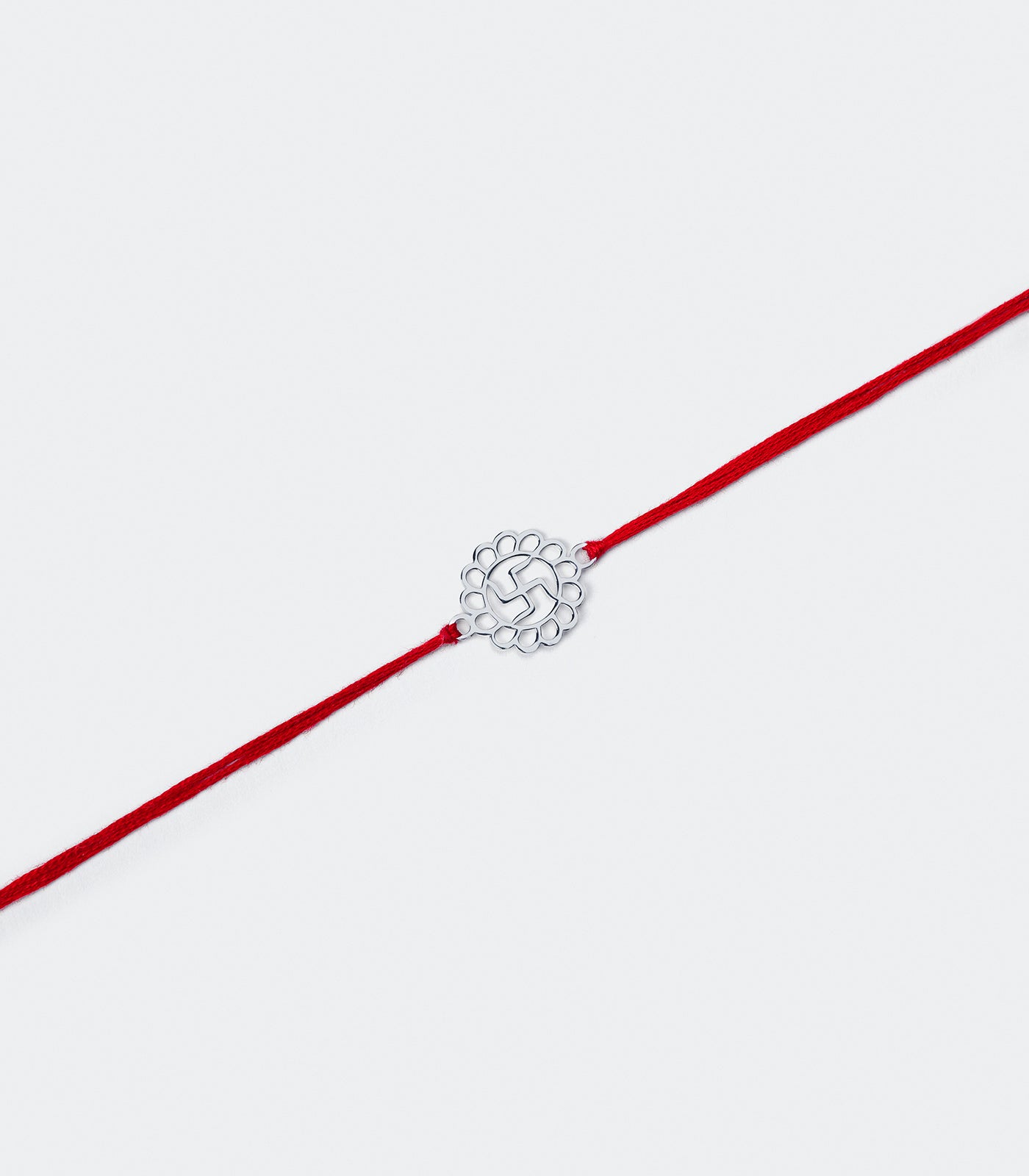 Elegant Silver Rakhi - Divine Swastik Design