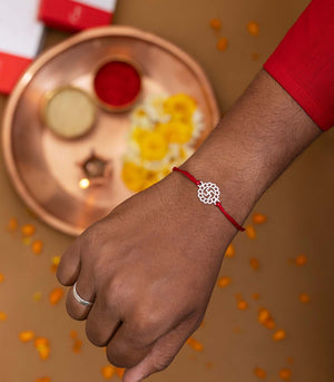 Elegant Silver Rakhi - The Understated Swastika Cut Out Design