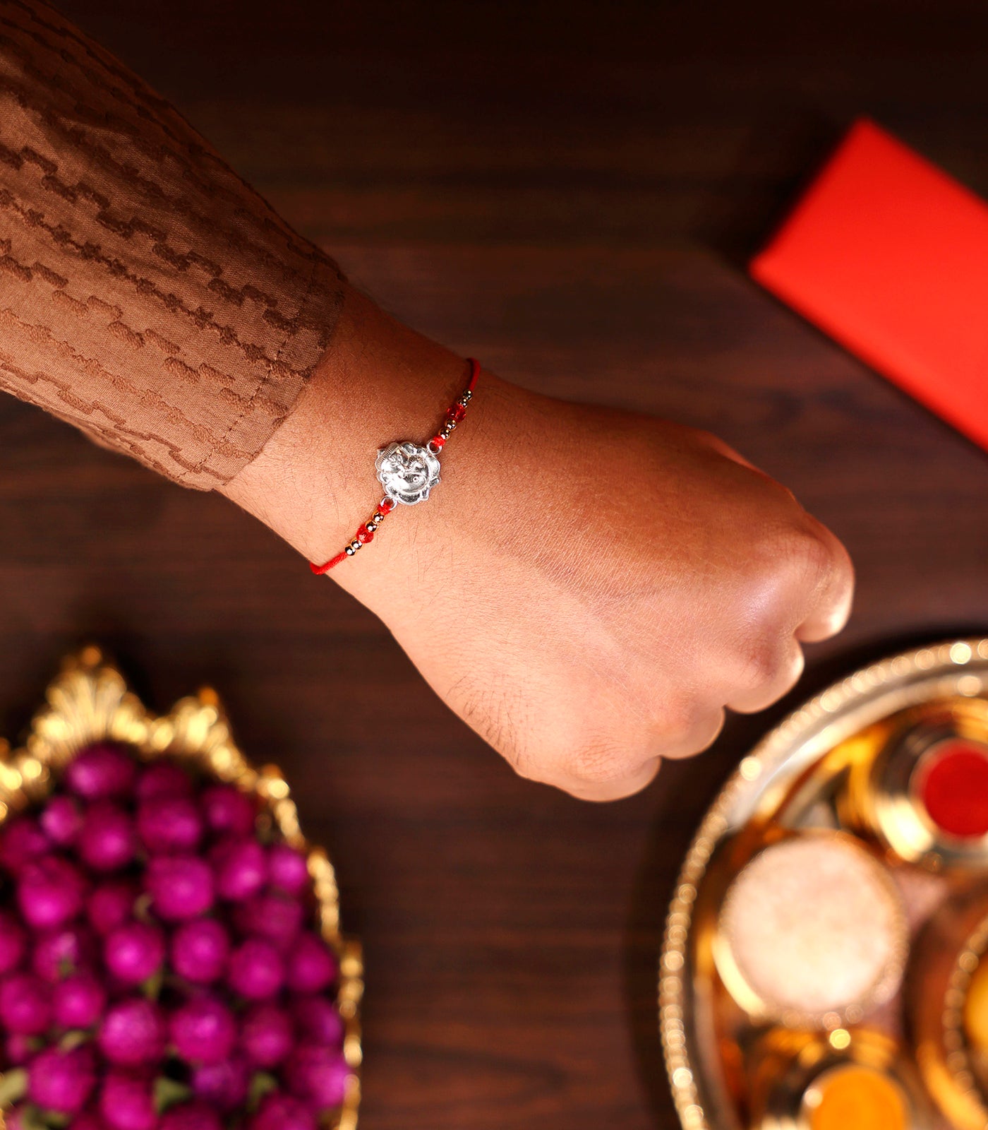 Silver Rakhi - The Divine Ganesh Design