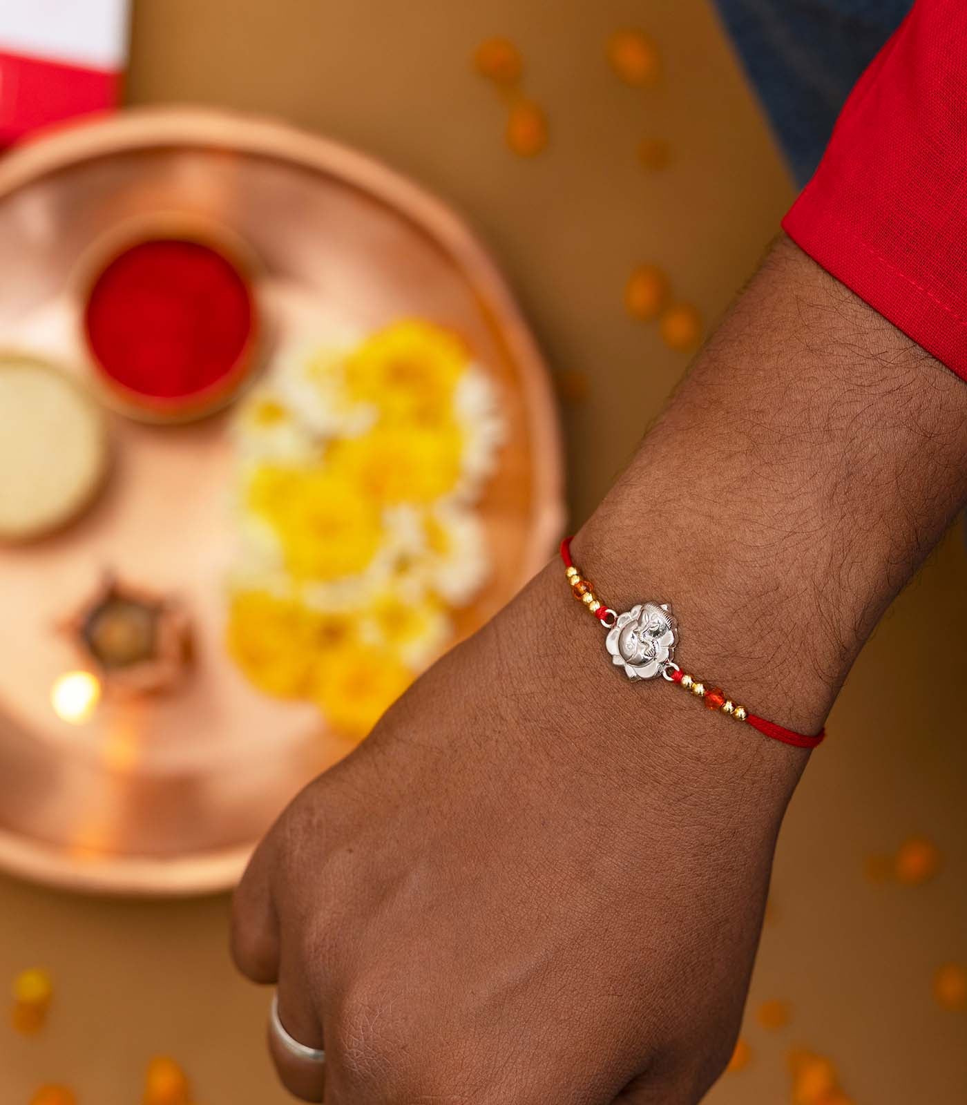 Silver Rakhi - The Divine Ganesh Design