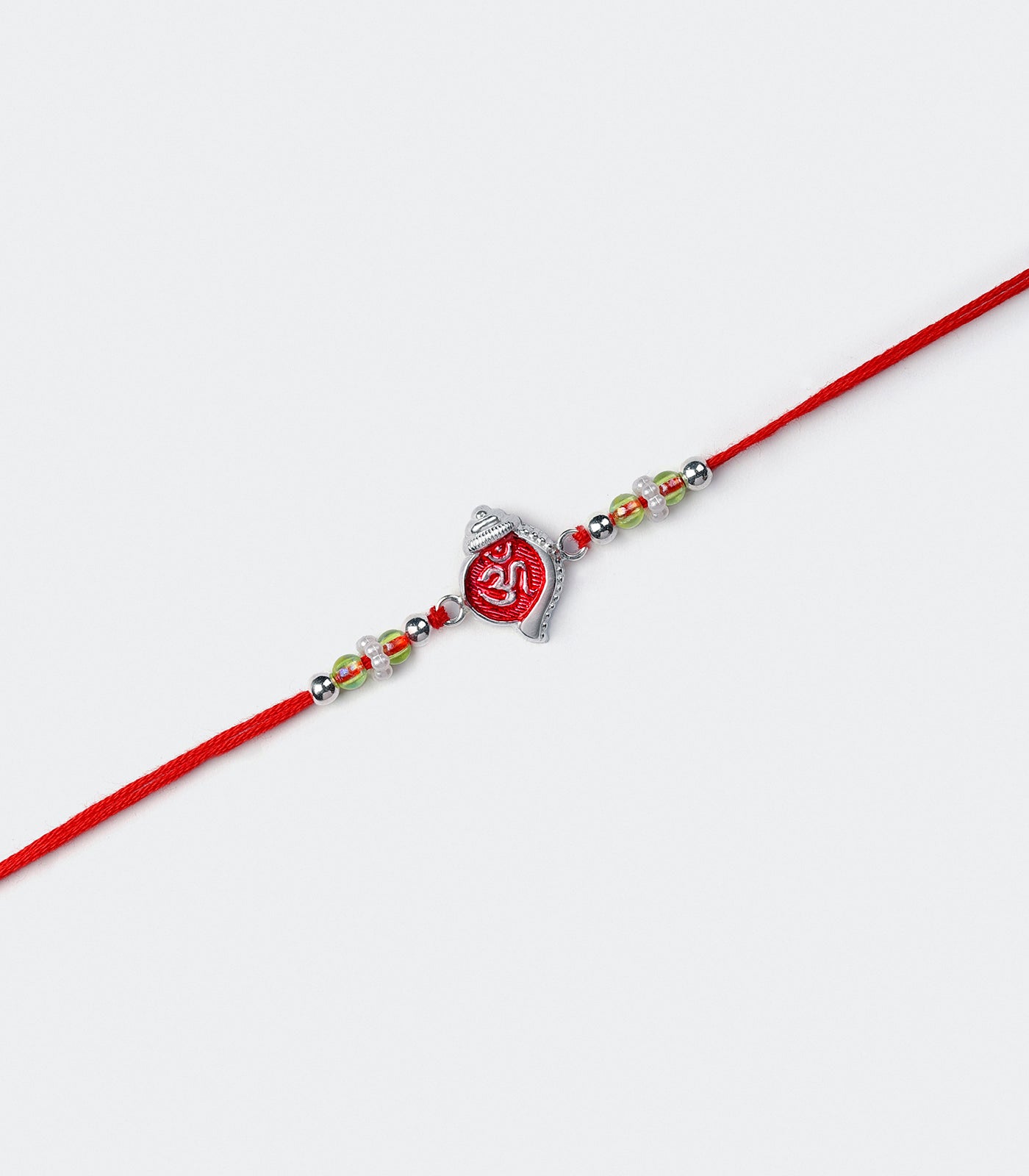 Stunning Silver Rakhi - The Elegant Om engraved Shankh Design