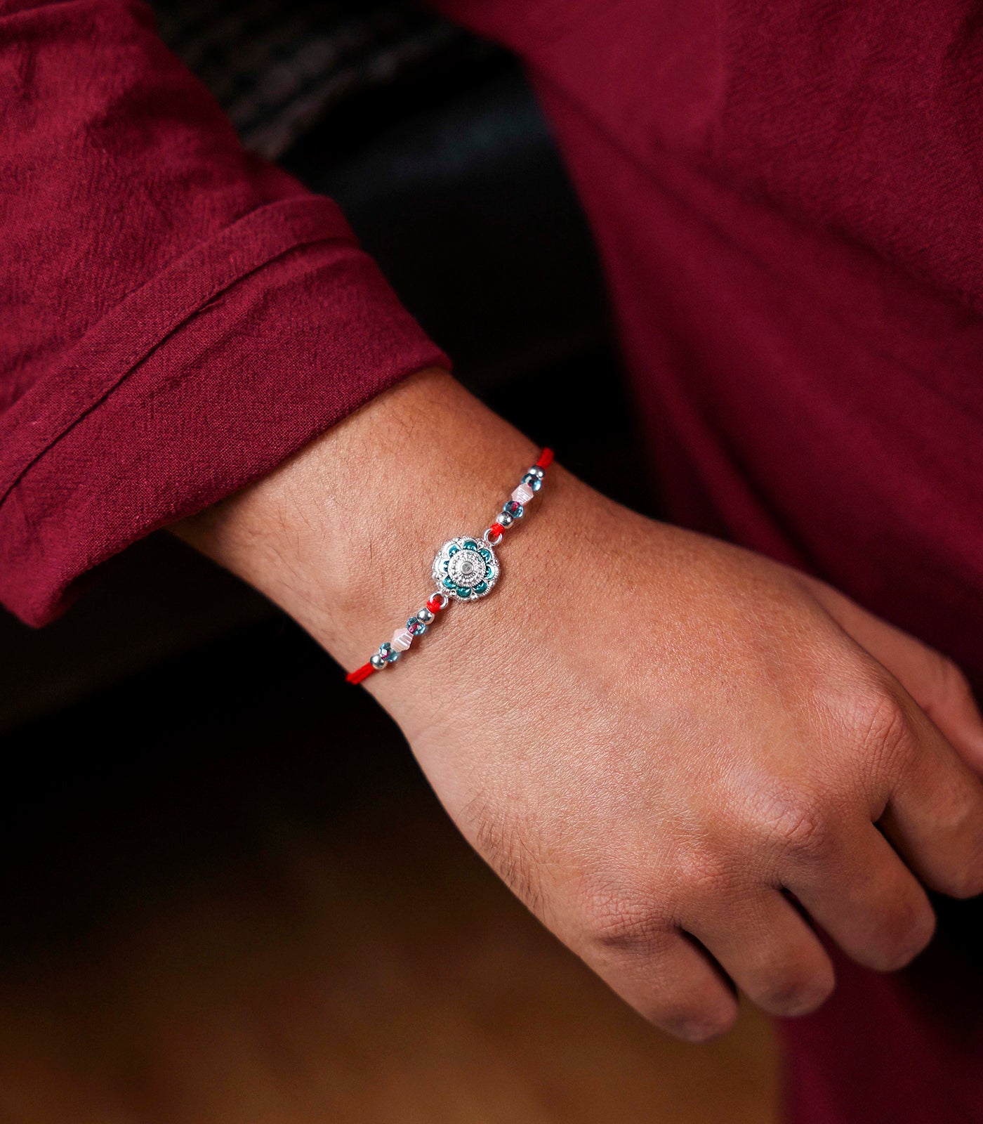 Beautiful Silver Rakhi - Aqua Blue Stone Design