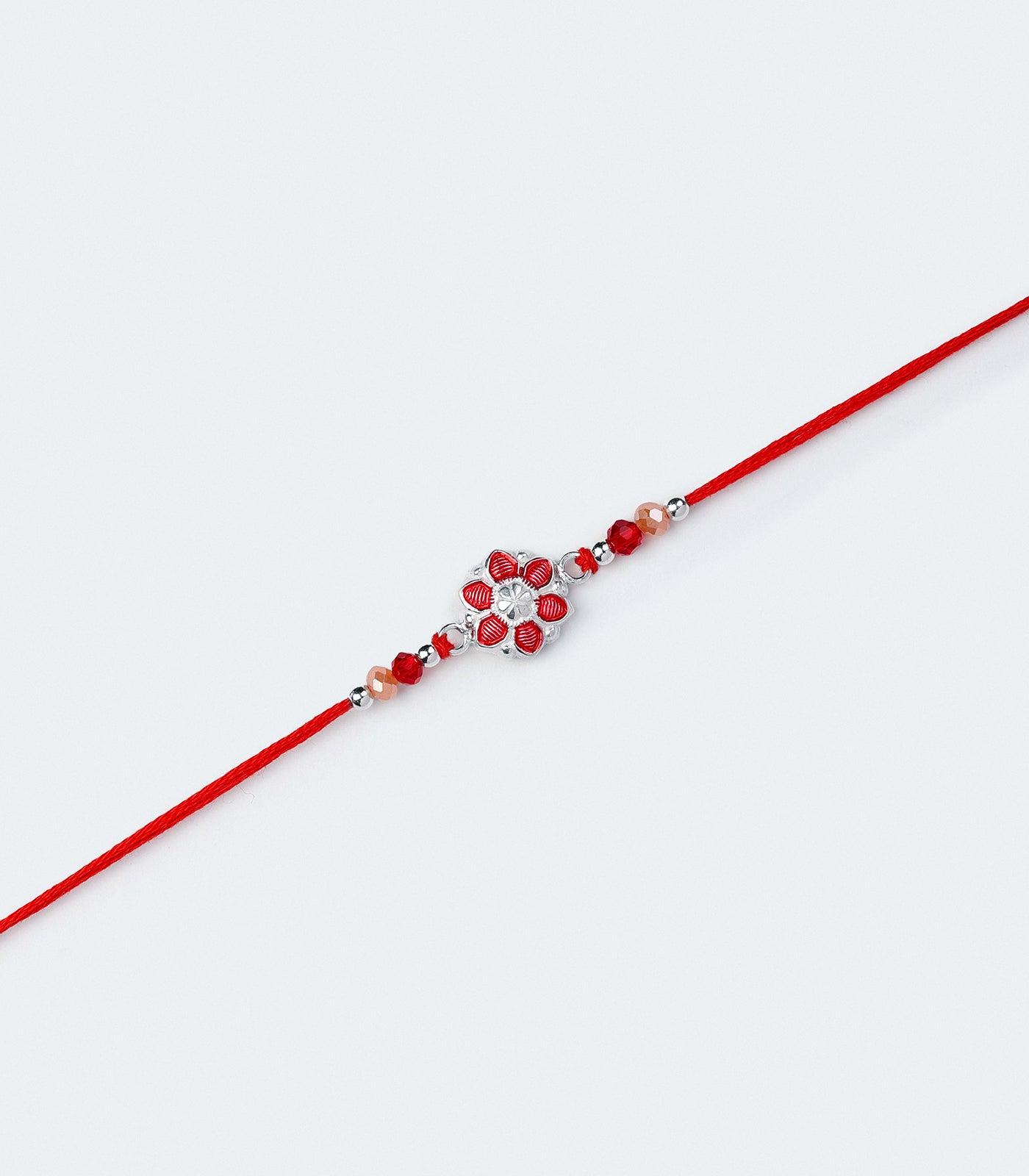 Beautiful Silver Rakhi - Red Petal Floral Design