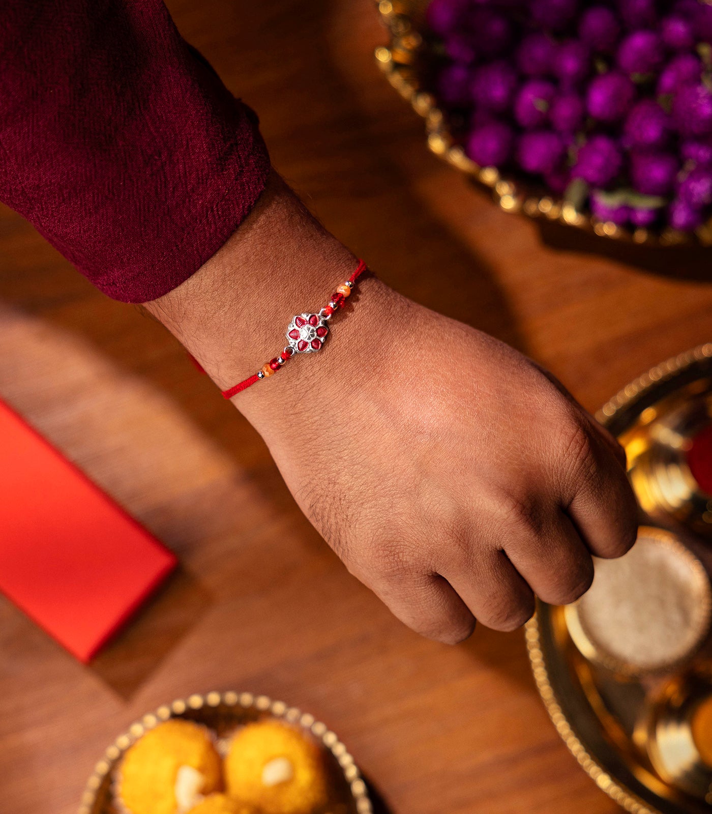 Beautiful Silver Rakhi - Red Petal Floral Design