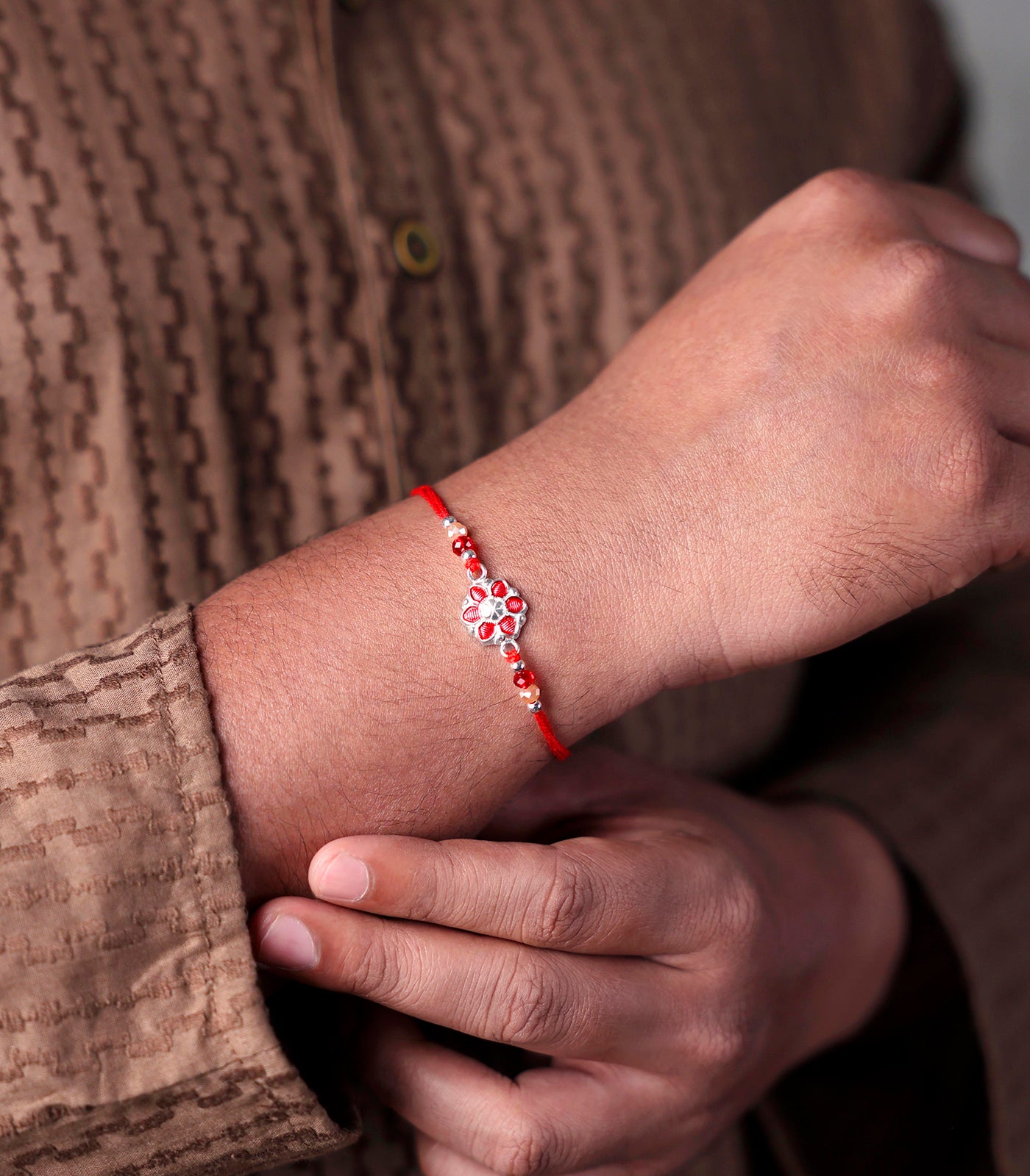 Beautiful Silver Rakhi - Red Petal Floral Design