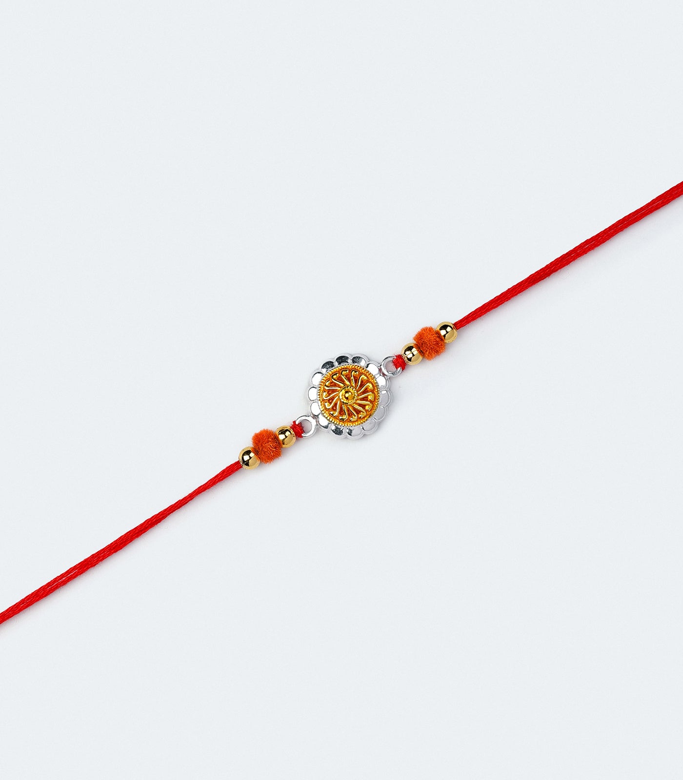 Beautiful Silver Rakhi - Golden Petals Design