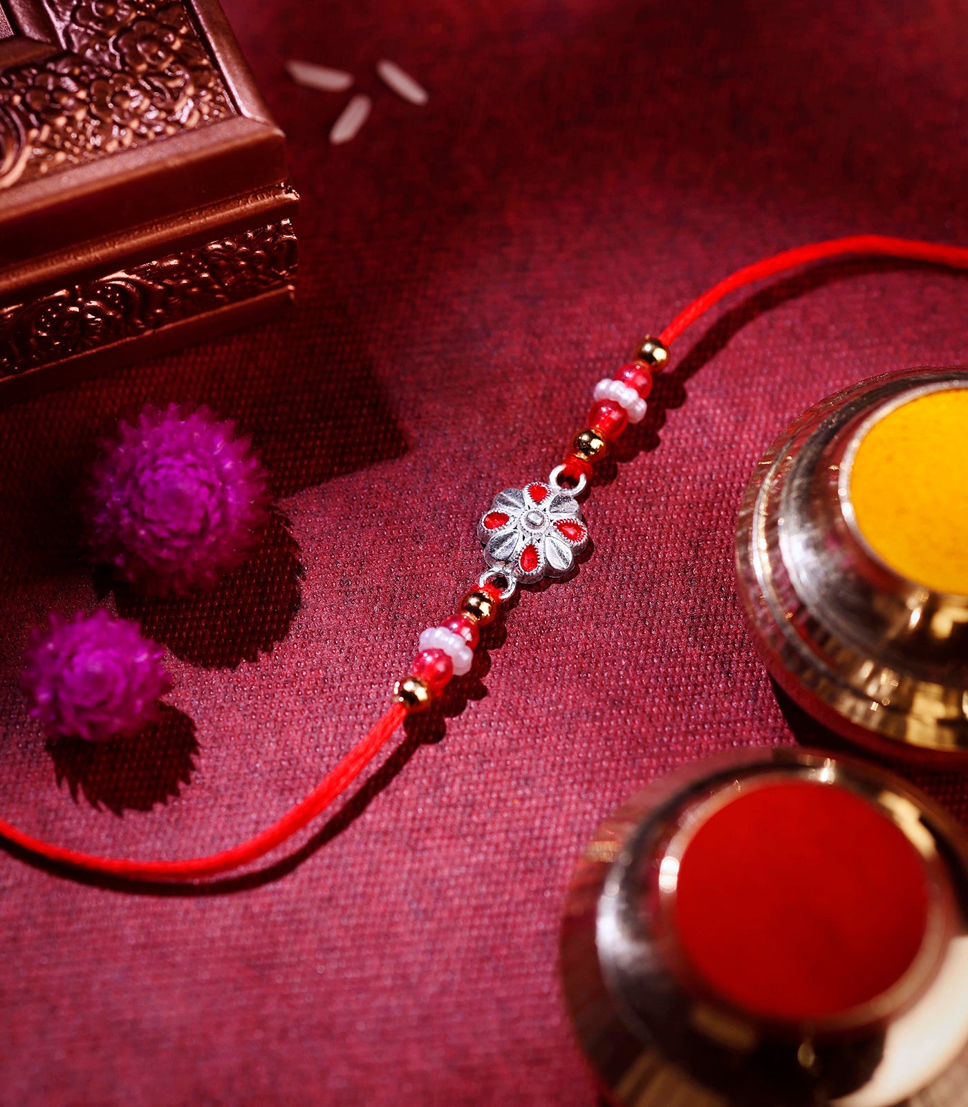 Stunning Silver Rakhi - Elegant Petal Design