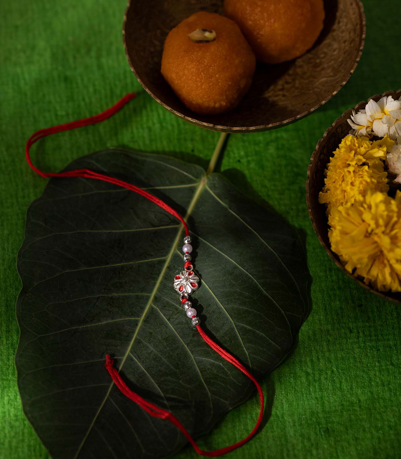 Stunning Silver Rakhi - Elegant Petal Design