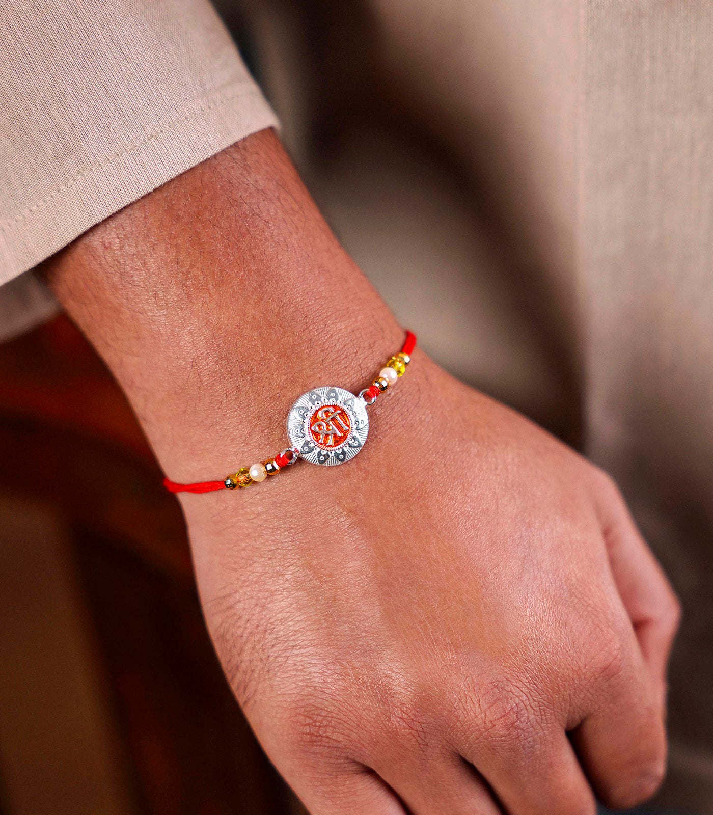 Stunning Silver Rakhi - Divine 'Shree' Engraved Round Design