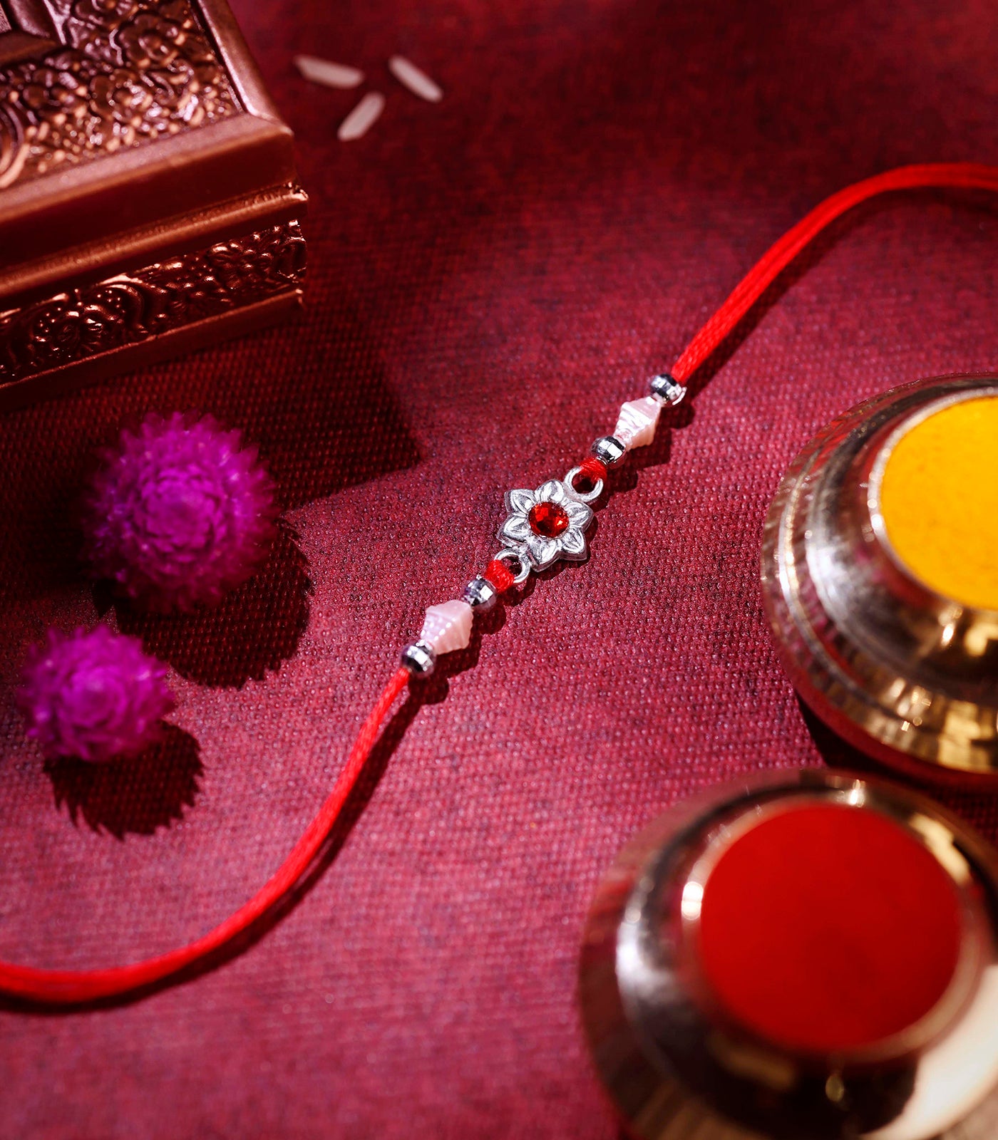 Beautiful Silver Rakhi - Red Stone Delicate floral Design