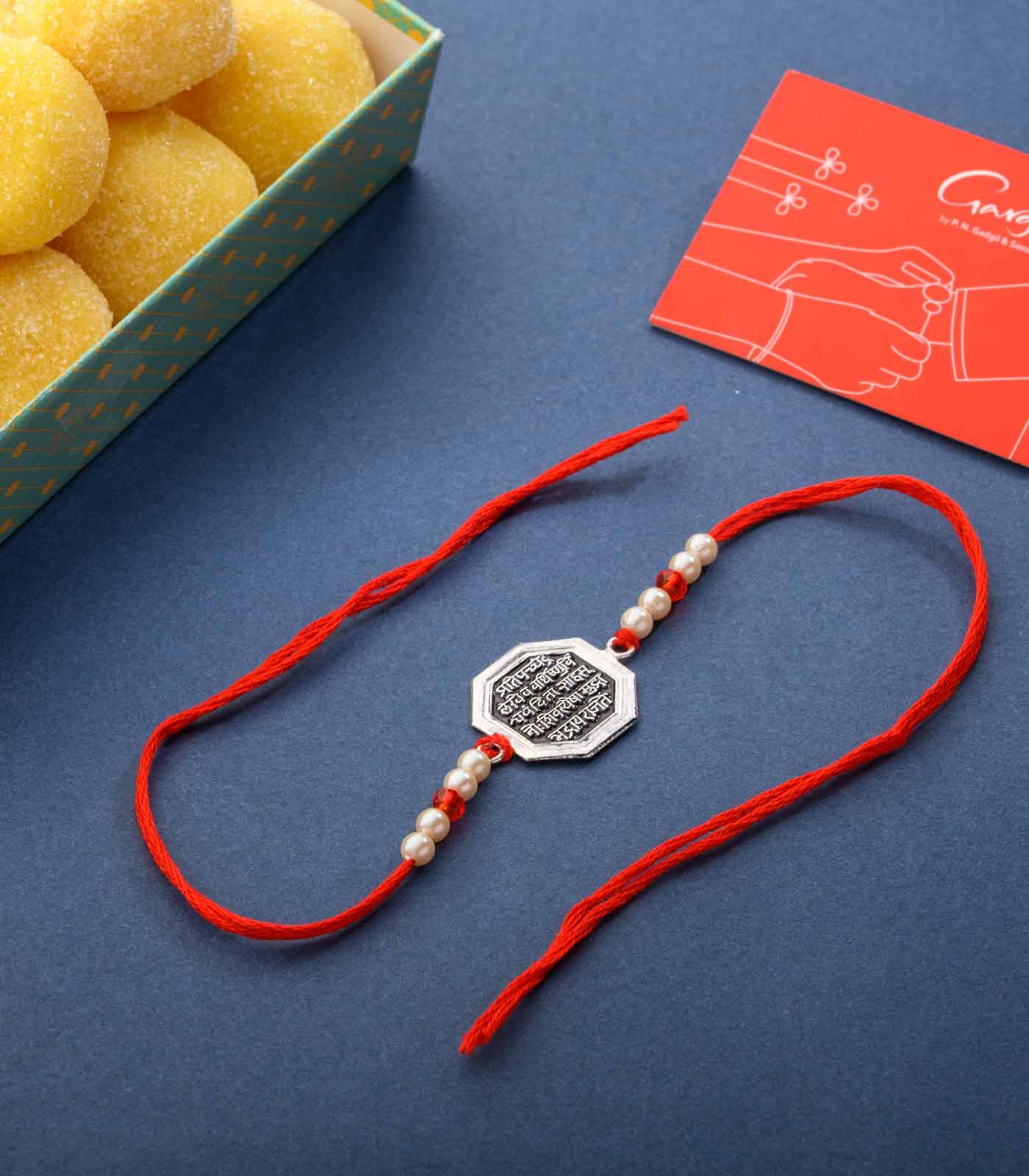 Beautiful Silver Rakhi - The Shivmudra Text Design
