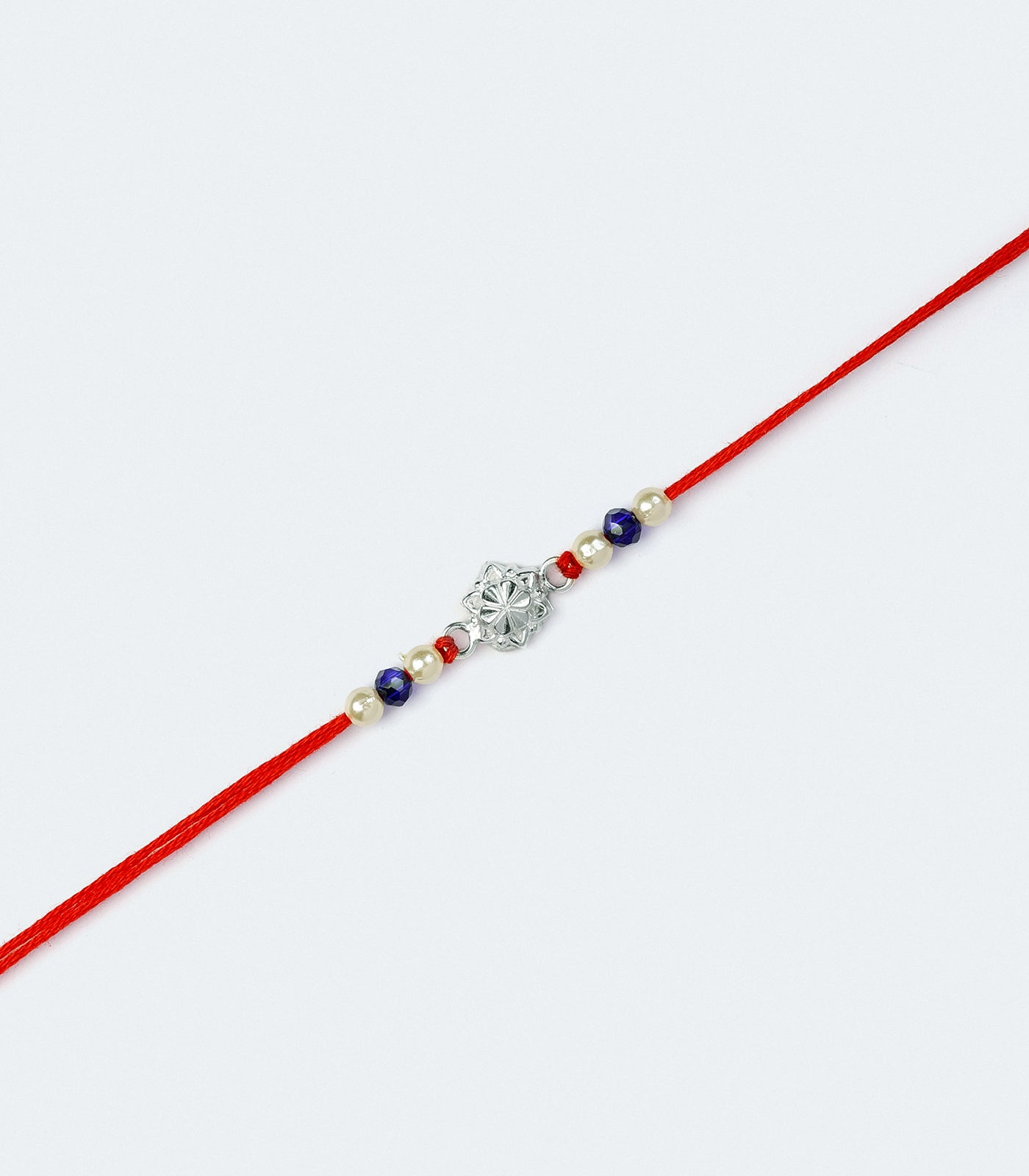 Stunning Silver Rakhi - The Elegant Star Flower Design
