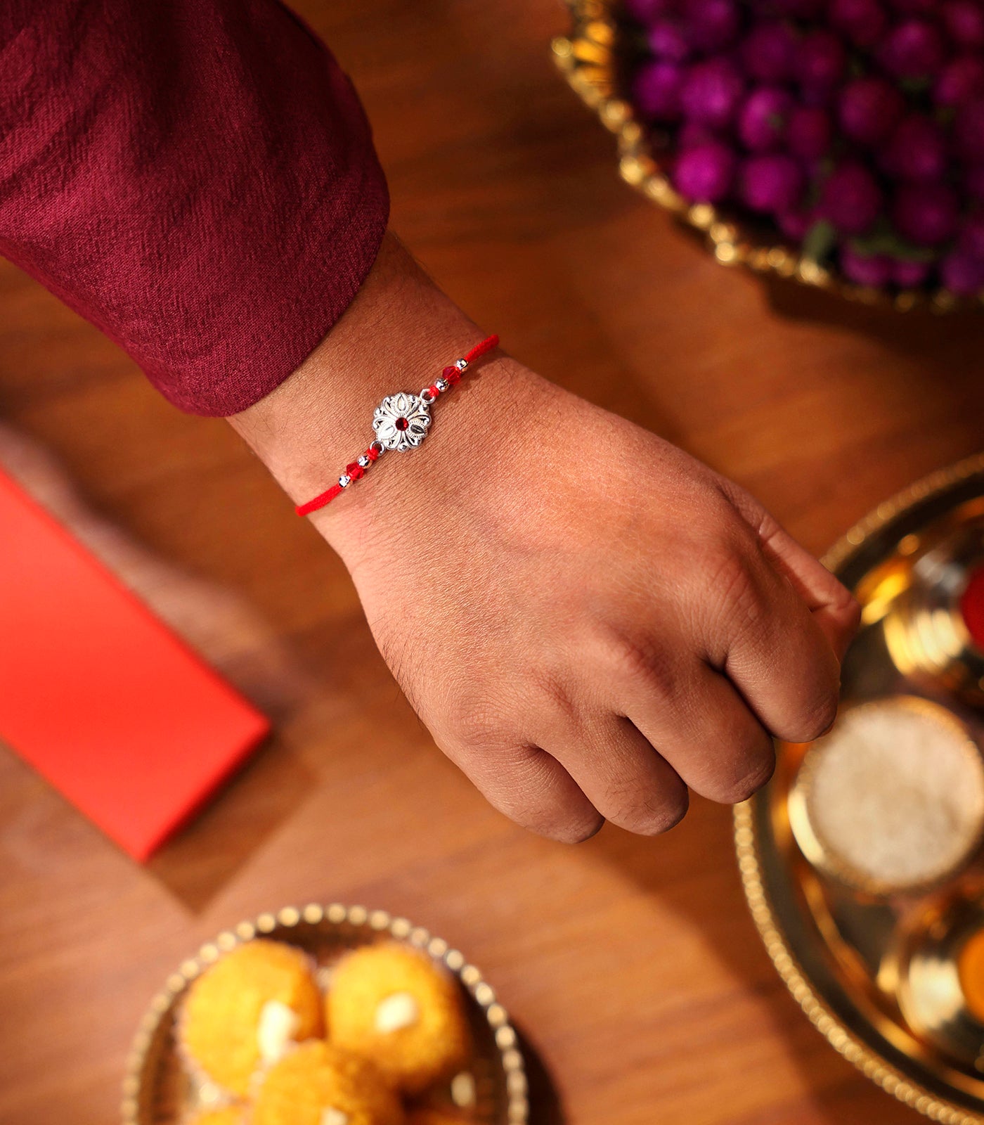 Beautiful Silver Rakhi - Delicate Tri-petal design