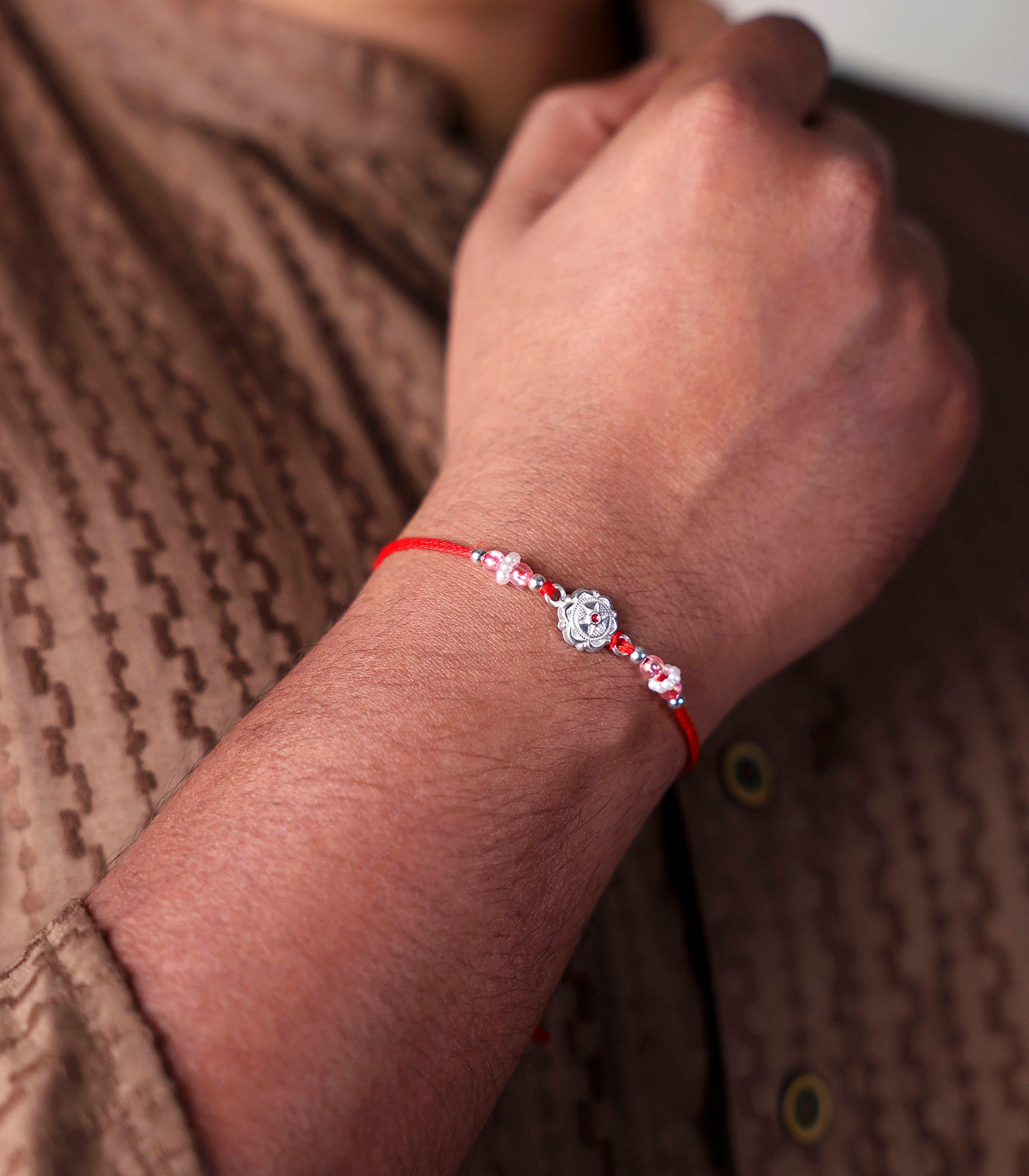 Stunning Silver Rakhi - The Elegant Star Design