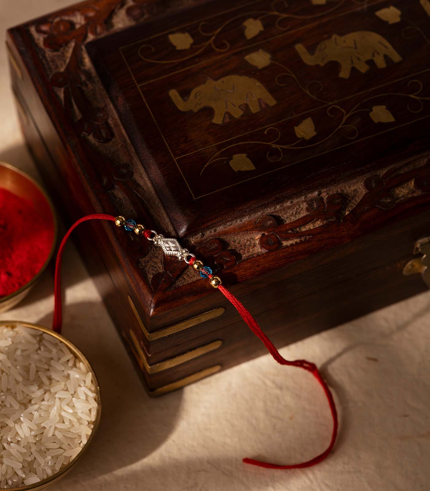 Beautiful Silver Rakhi - Diamond Shaped Dial