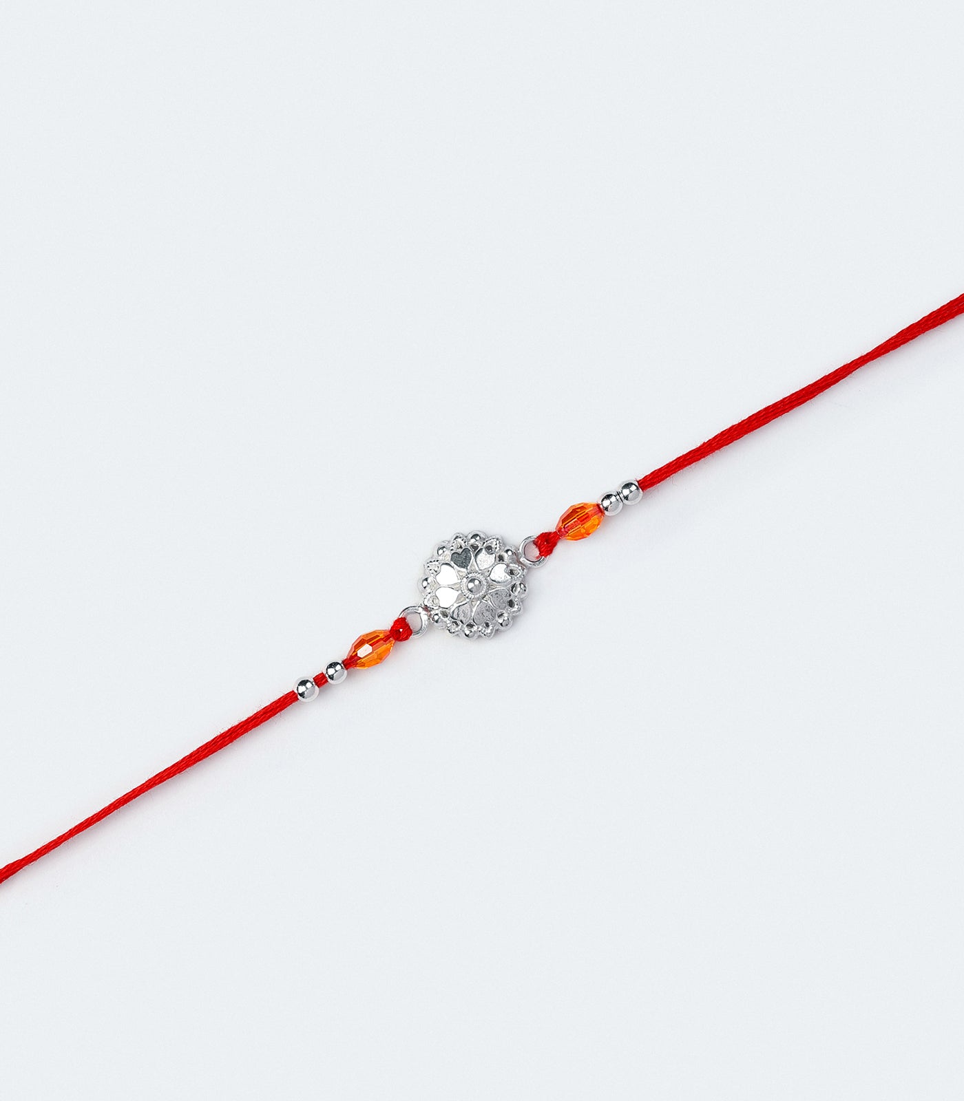 Stunning Silver Rakhi - The Elegant Heart Petal Design