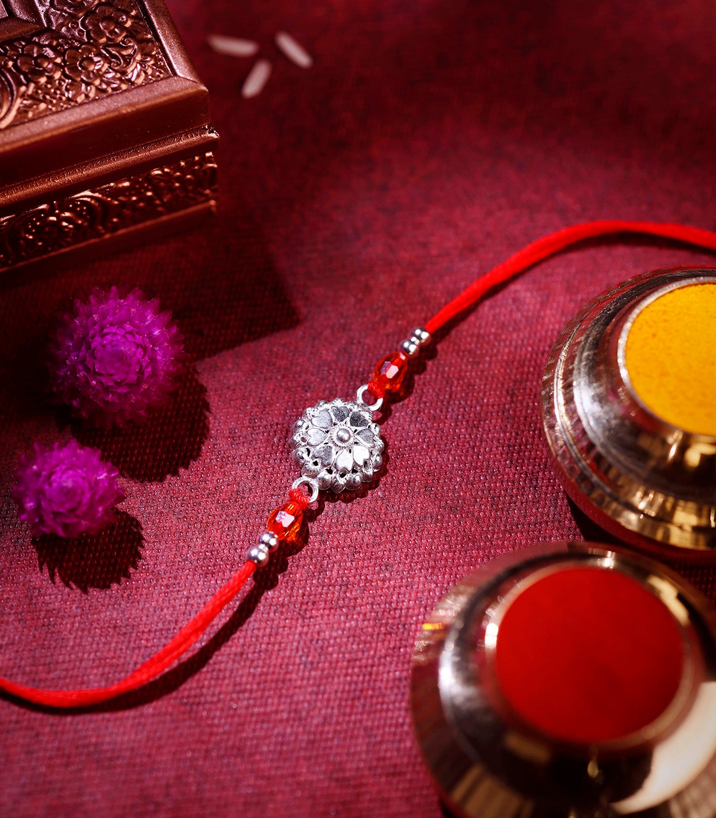 Stunning Silver Rakhi - The Elegant Heart Petal Design