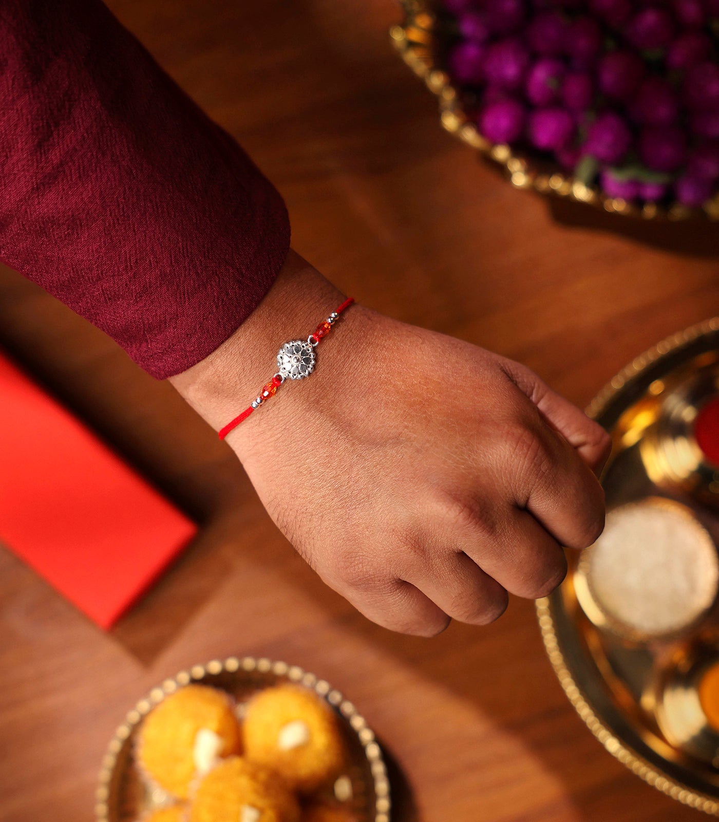 Stunning Silver Rakhi - The Elegant Heart Petal Design