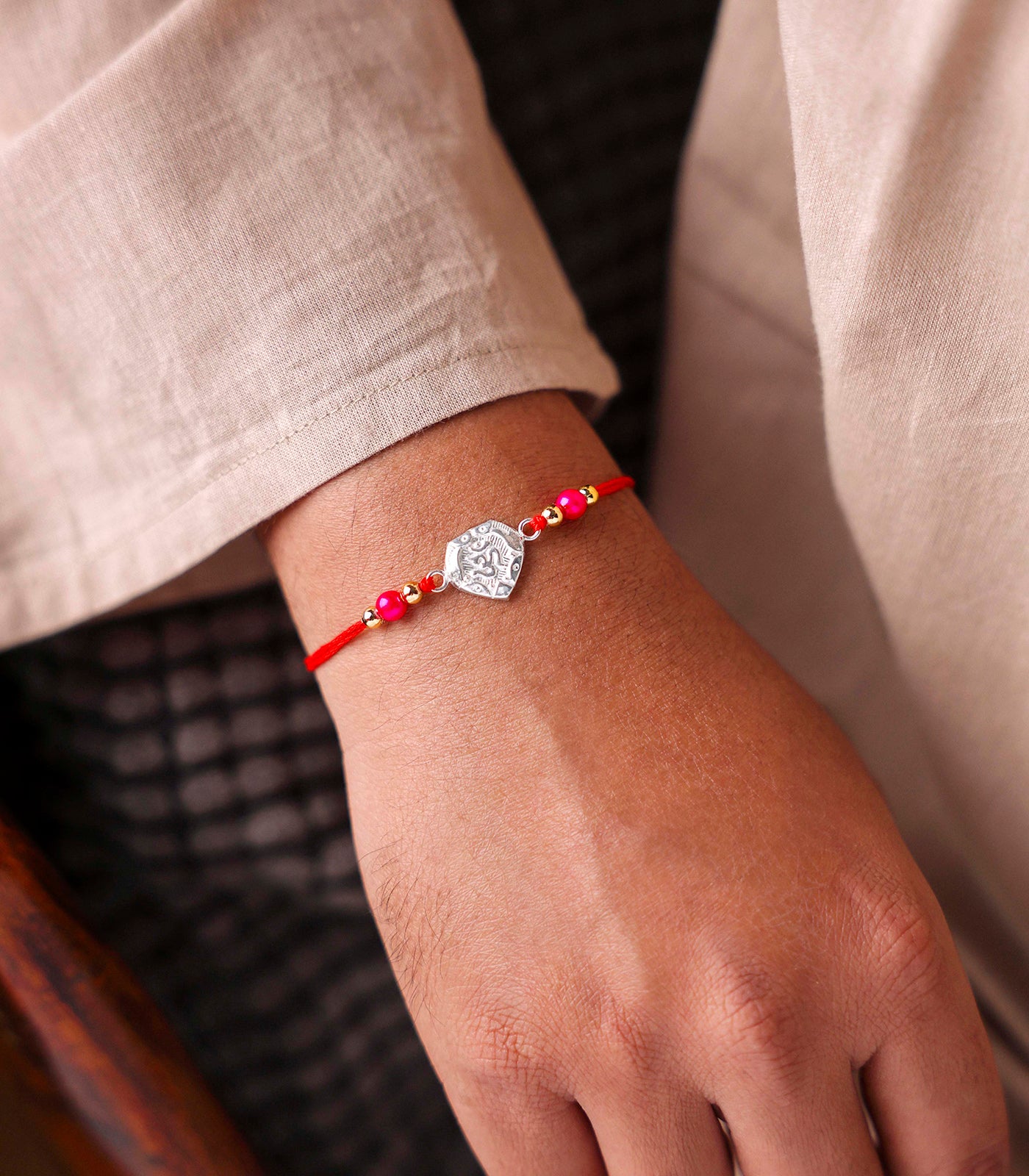 Stunning Silver Rakhi - OM Engraved Heart Design