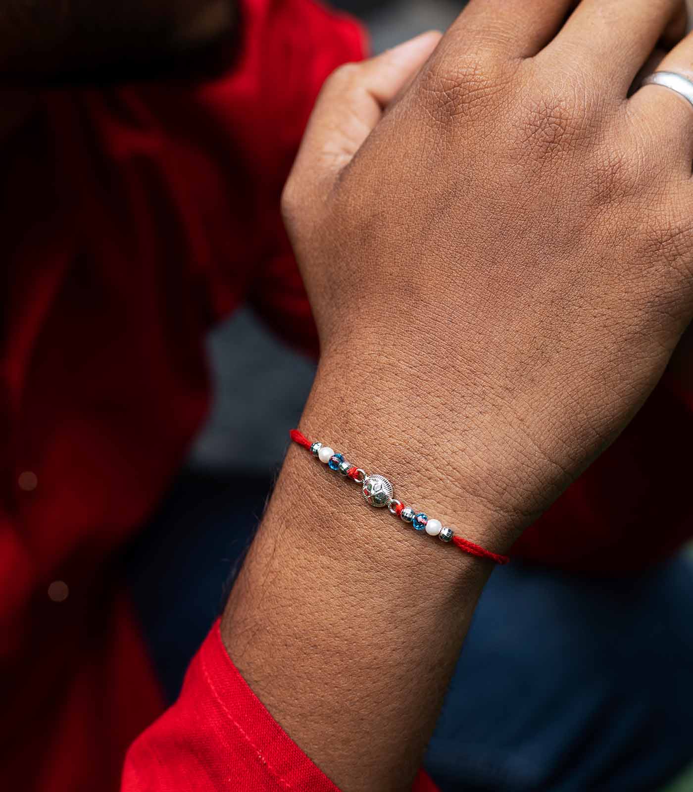 Stunning Silver Rakhi - The Elegant Star Design
