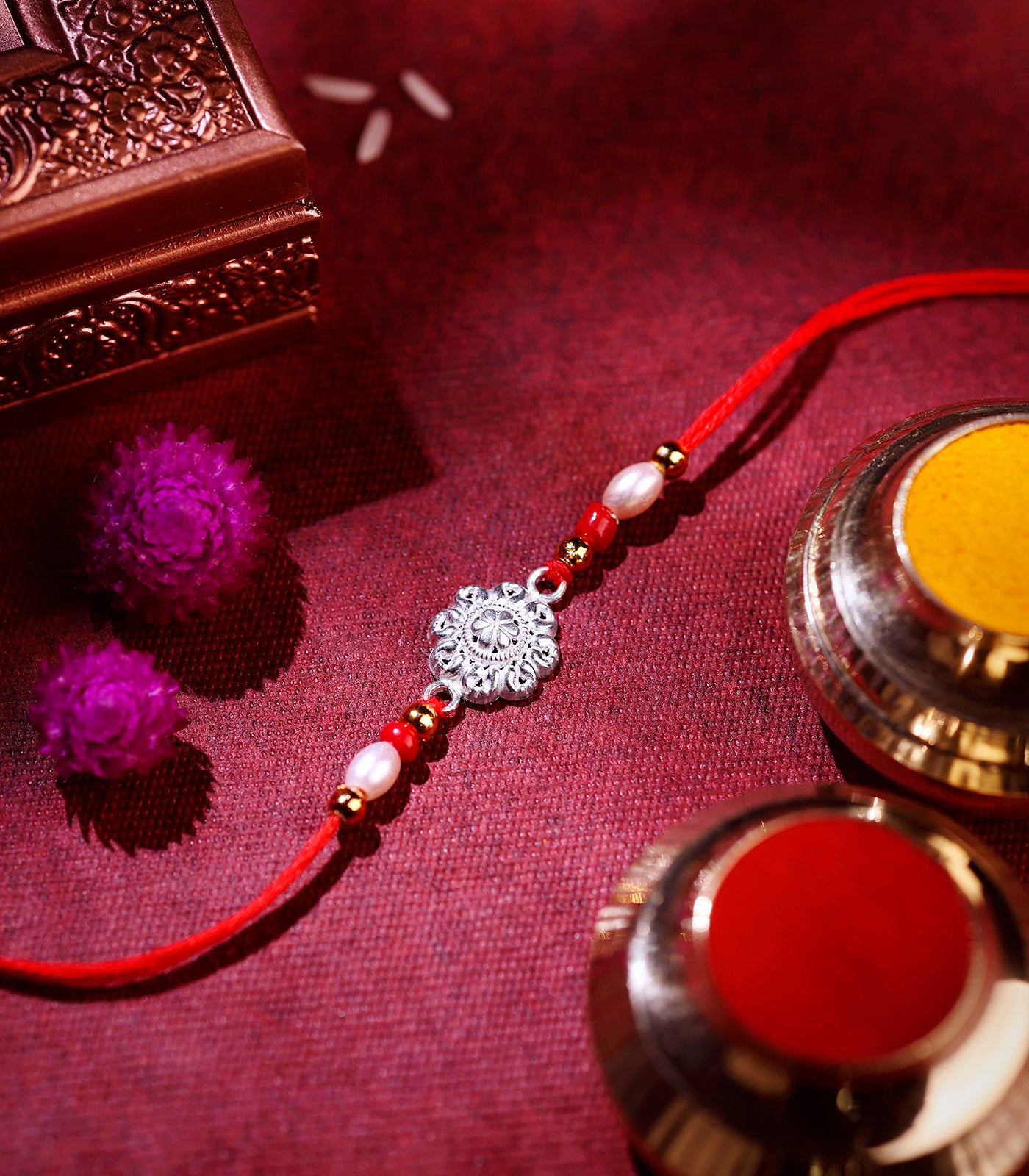 Beautiful Silver Rakhi - Small Flower Design