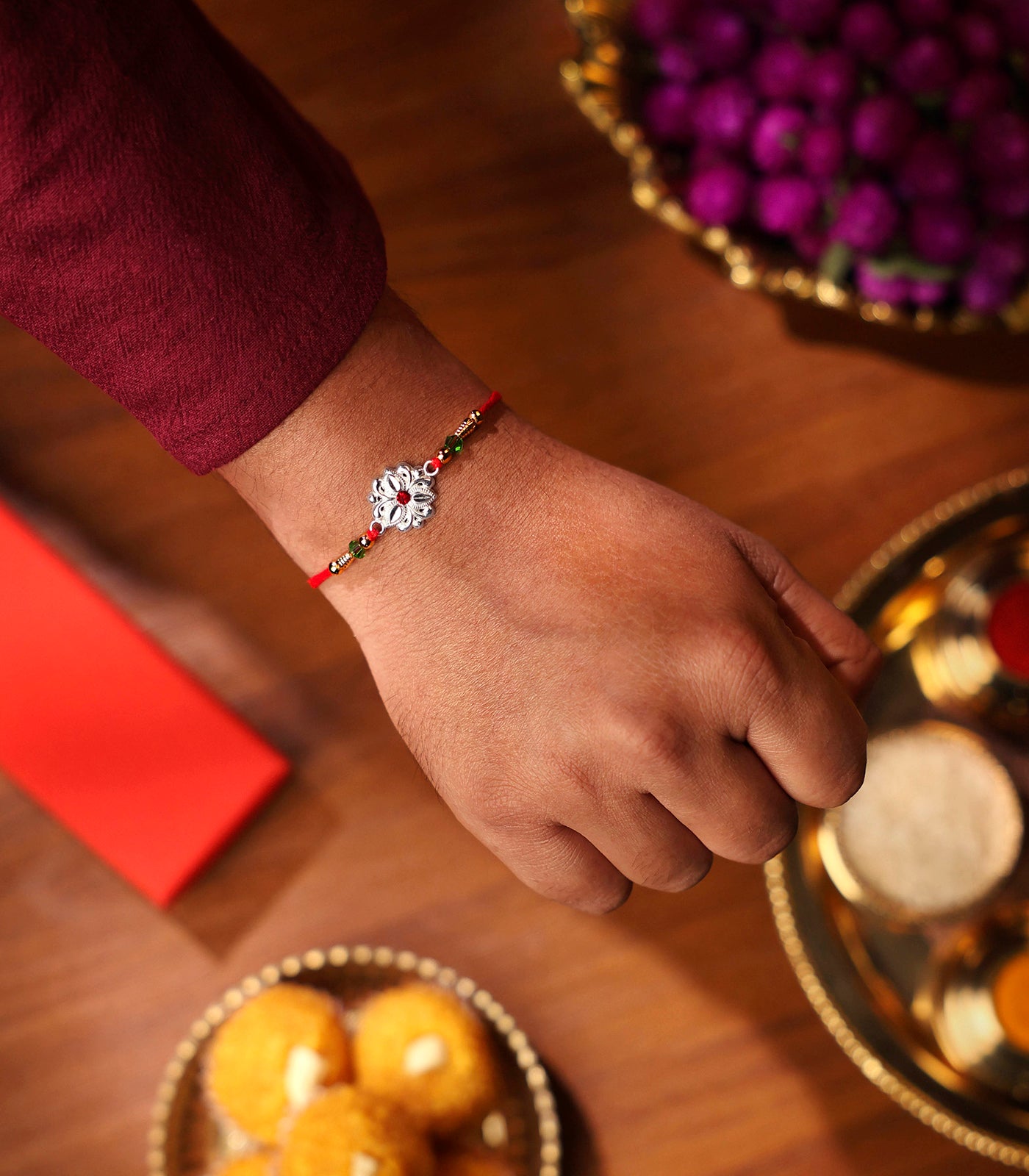 Beautiful Silver Rakhi - Delicate Tri-petal design