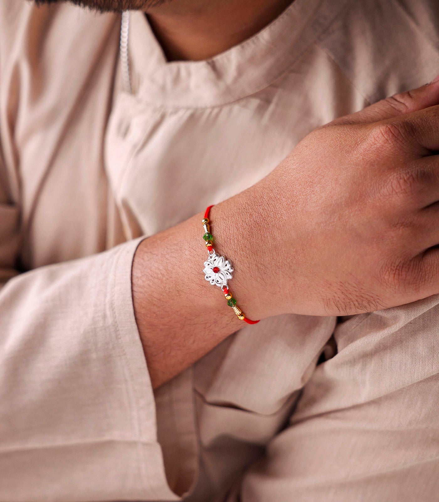 Beautiful Silver Rakhi - Delicate Tri-petal design