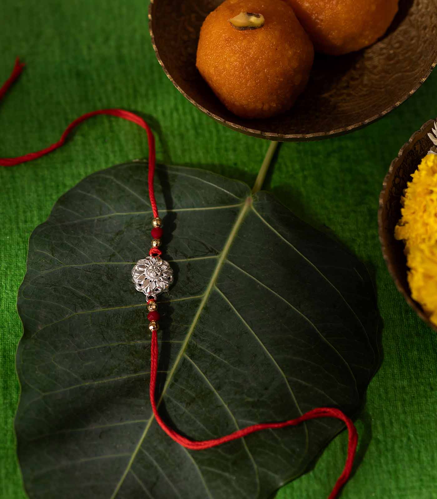 Beautiful Silver Rakhi - Dual Diamond Petals Design