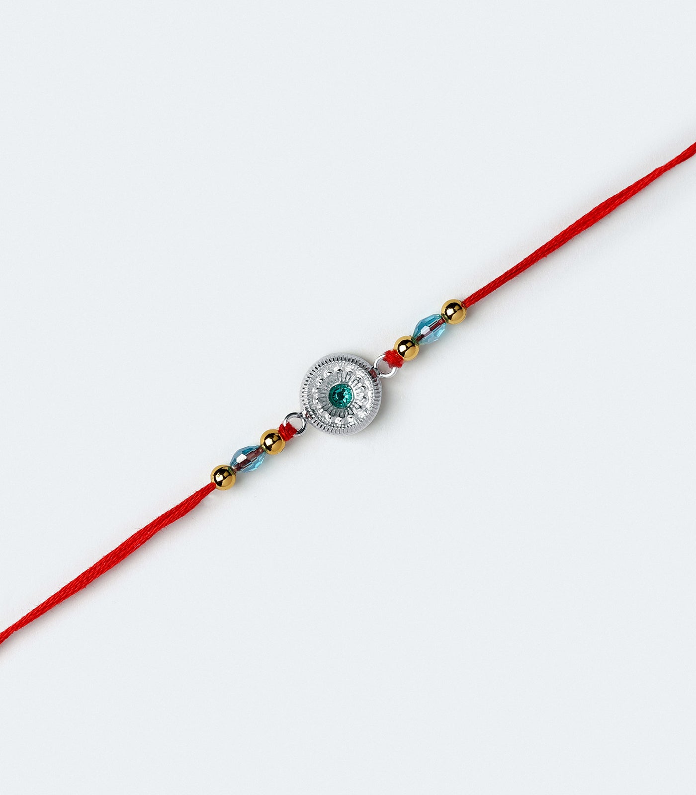 Beautiful Silver Rakhi - Round Shape Aqua Blue Stone Design