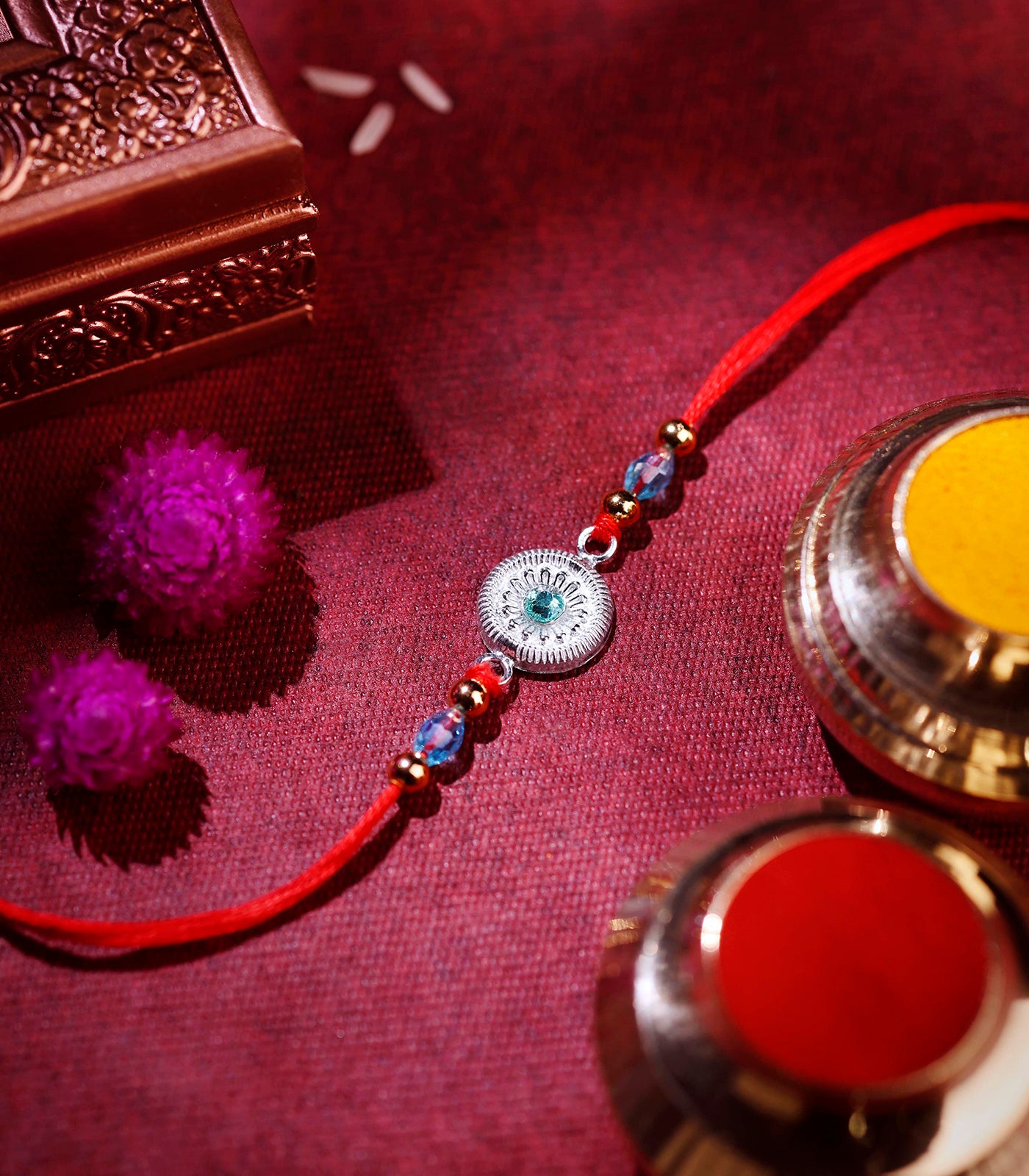 Beautiful Silver Rakhi - Round Shape Aqua Blue Stone Design
