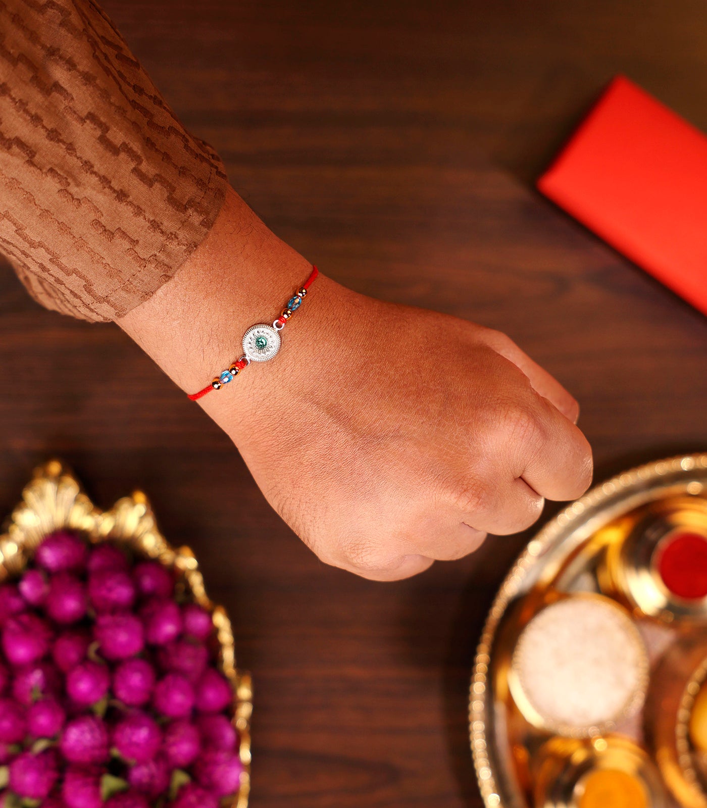 Beautiful Silver Rakhi - Round Shape Aqua Blue Stone Design