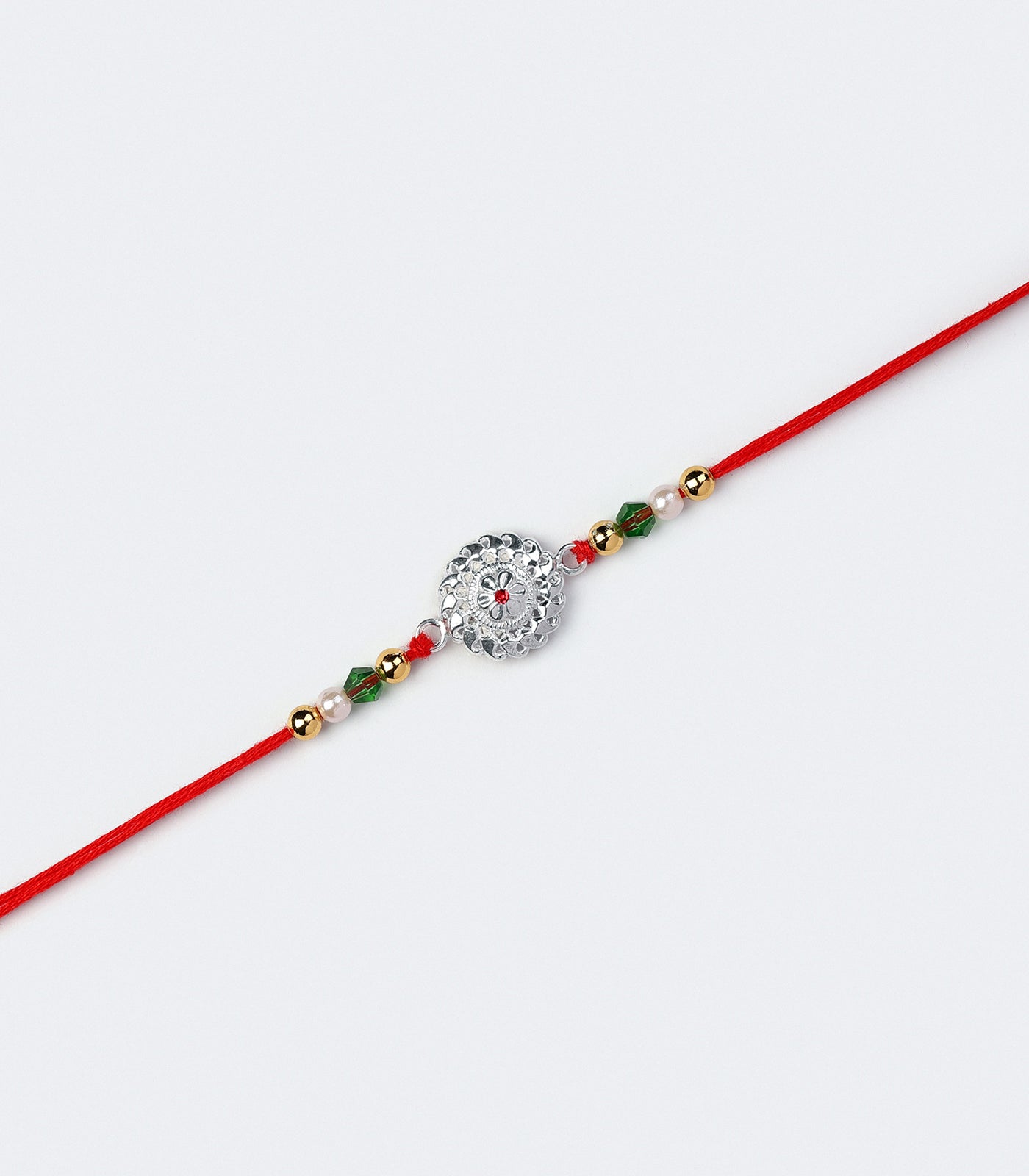 Stunning Silver Rakhi - The Elegant Multilayered Chakra Design