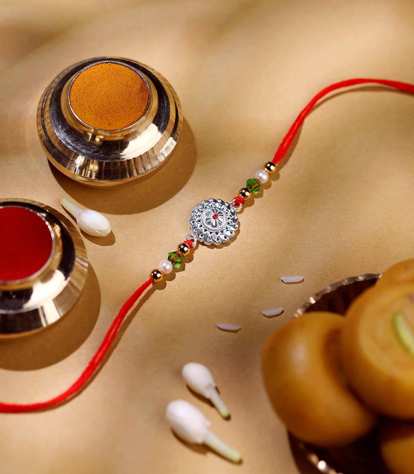 Stunning Silver Rakhi - The Elegant Multilayered Chakra Design