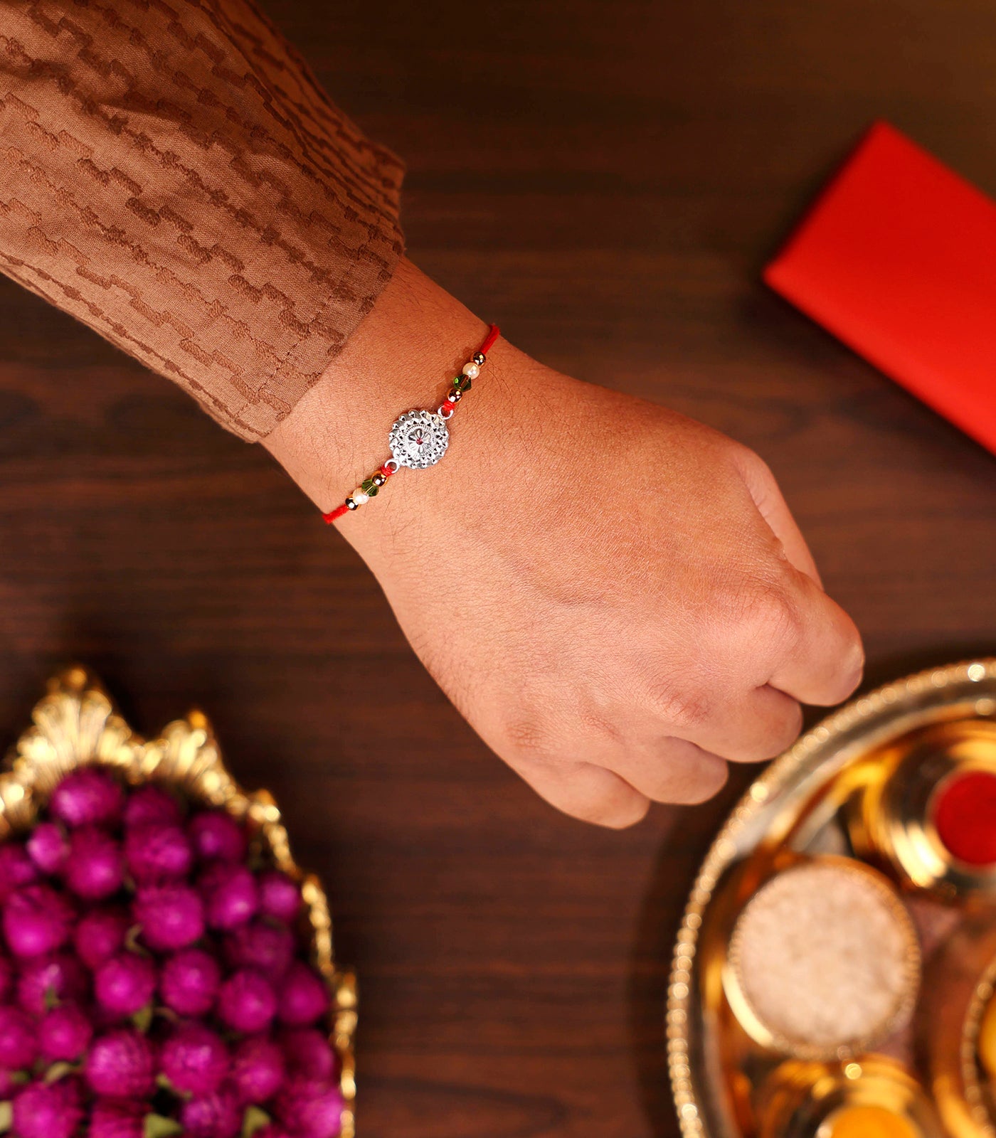 Stunning Silver Rakhi - The Elegant Multilayered Chakra Design