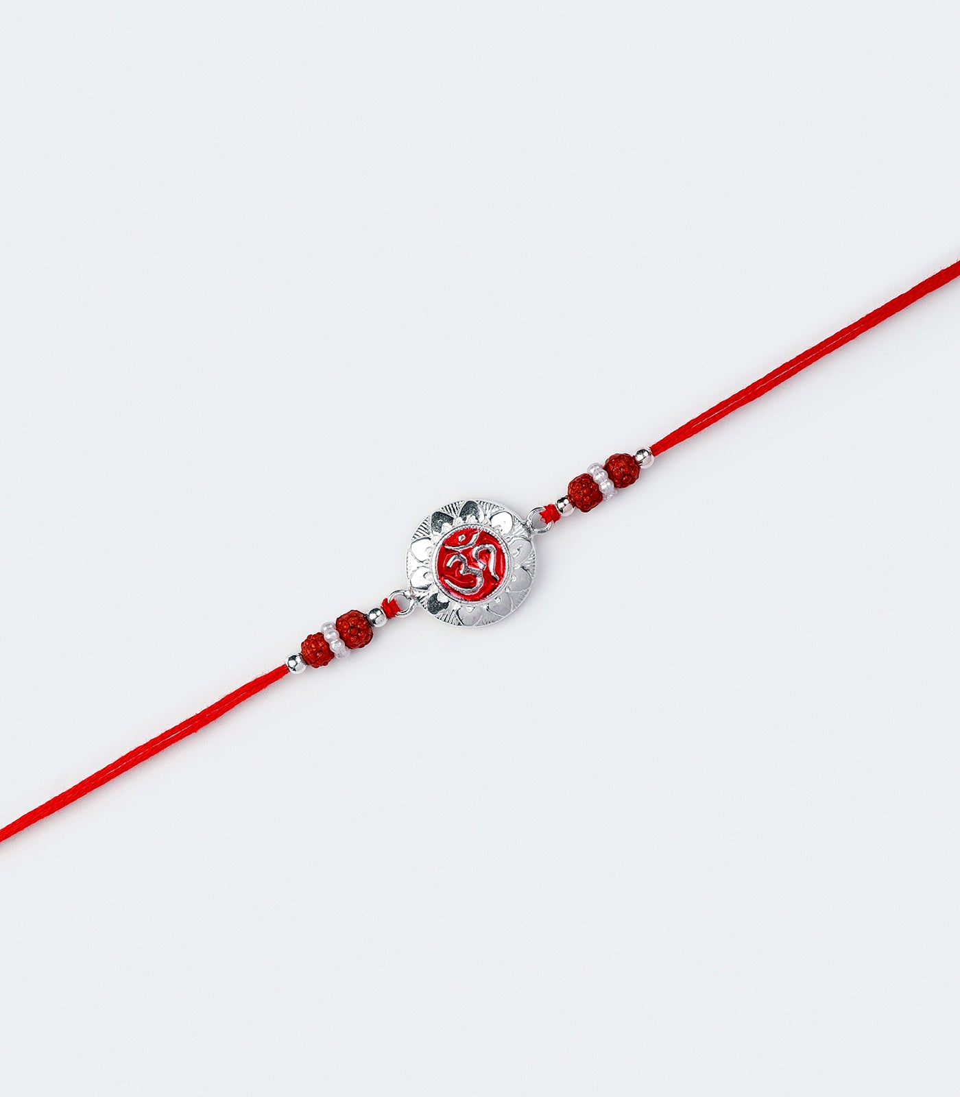 Stunning Silver Rakhi - OM Engraved Circular Design