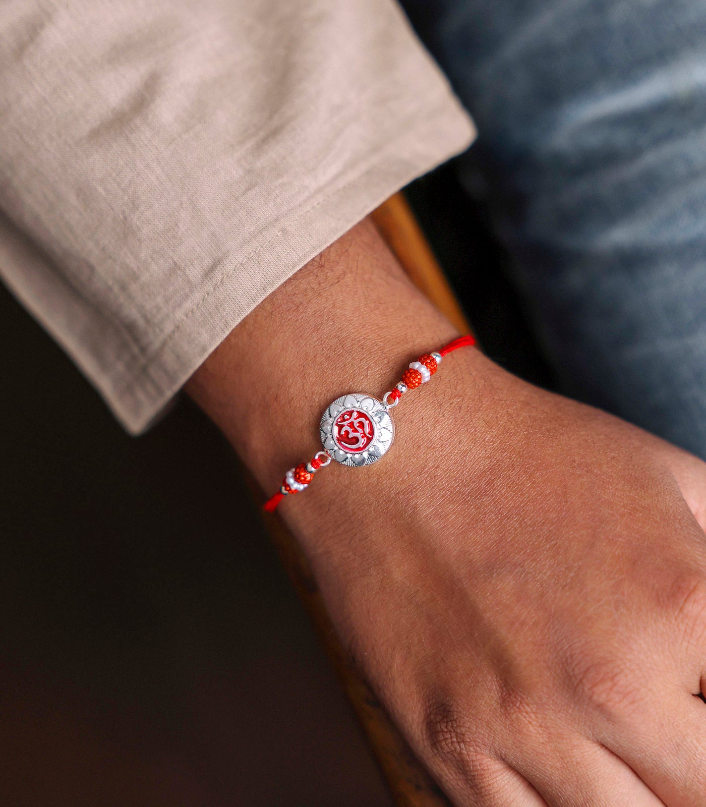 Stunning Silver Rakhi - OM Engraved Circular Design