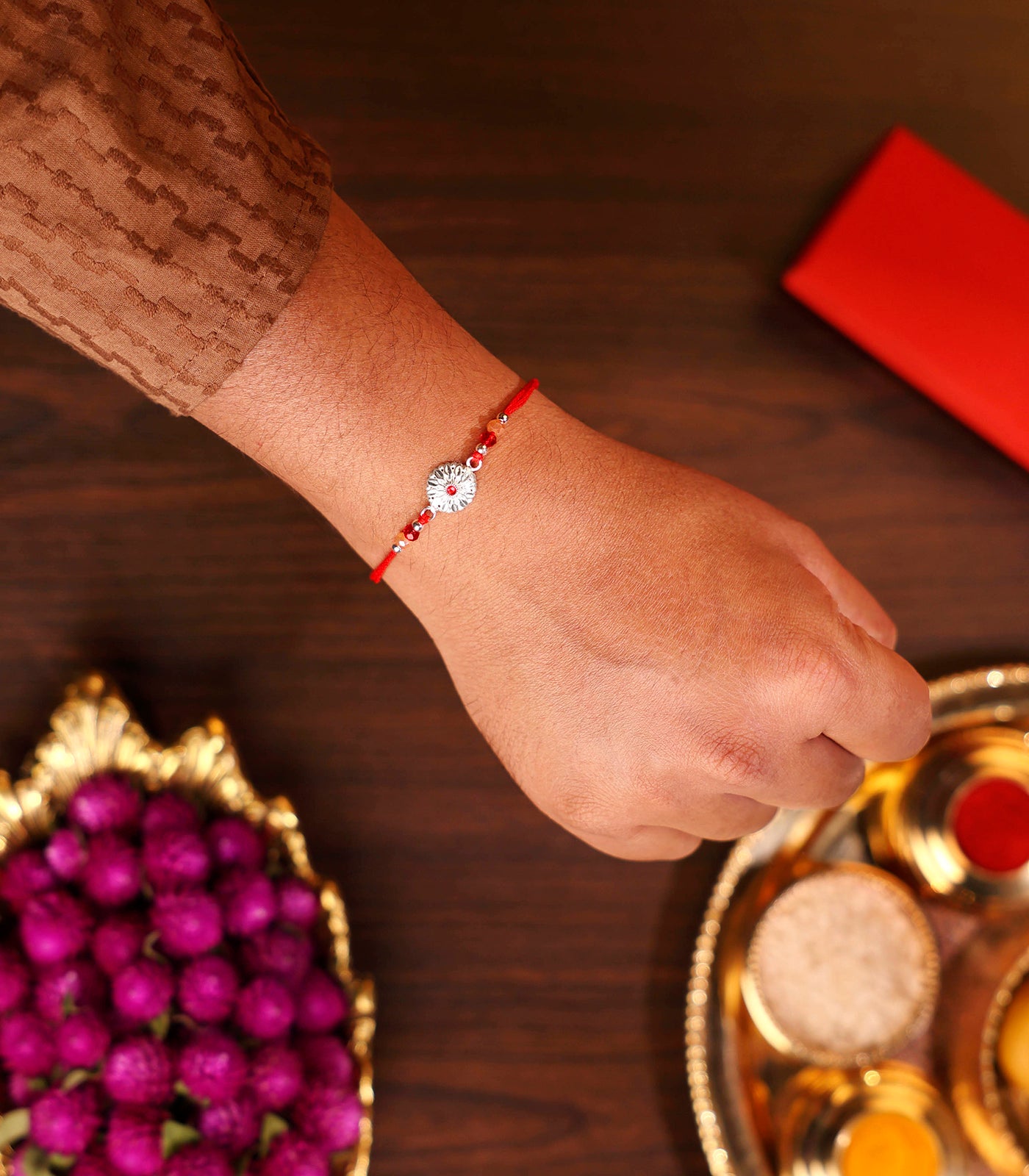 Stunning Silver Rakhi - The Elegant Petal Design