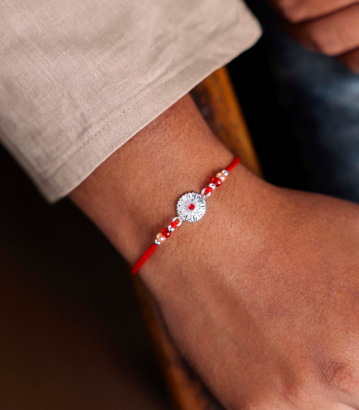 Stunning Silver Rakhi - The Elegant Petal Design