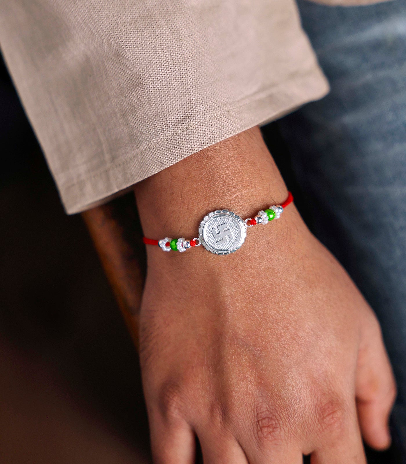 Beautiful Silver Rakhi - Swastik Engraved Design