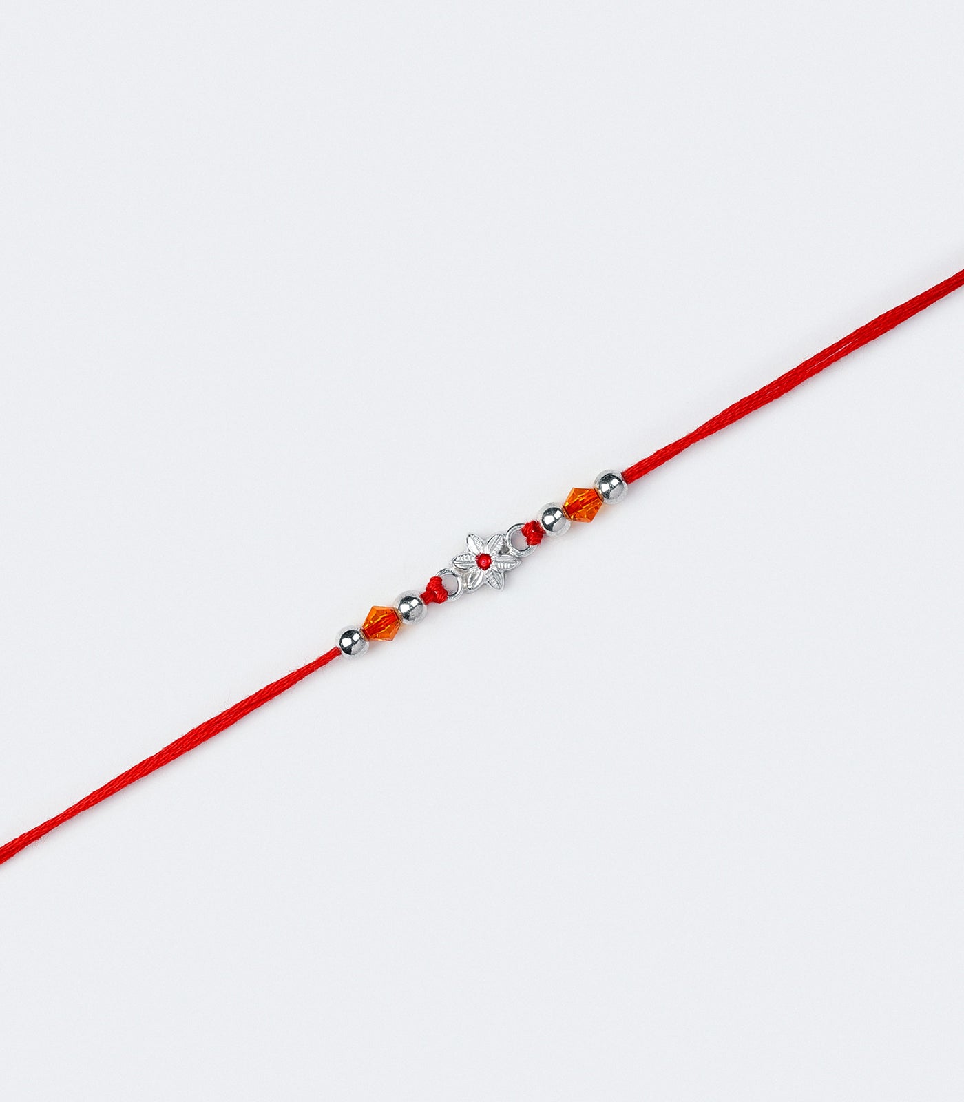 Stunning Silver Rakhi - The Elegant Floral Design
