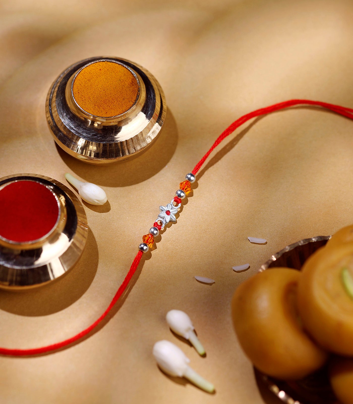 Stunning Silver Rakhi - The Elegant Floral Design
